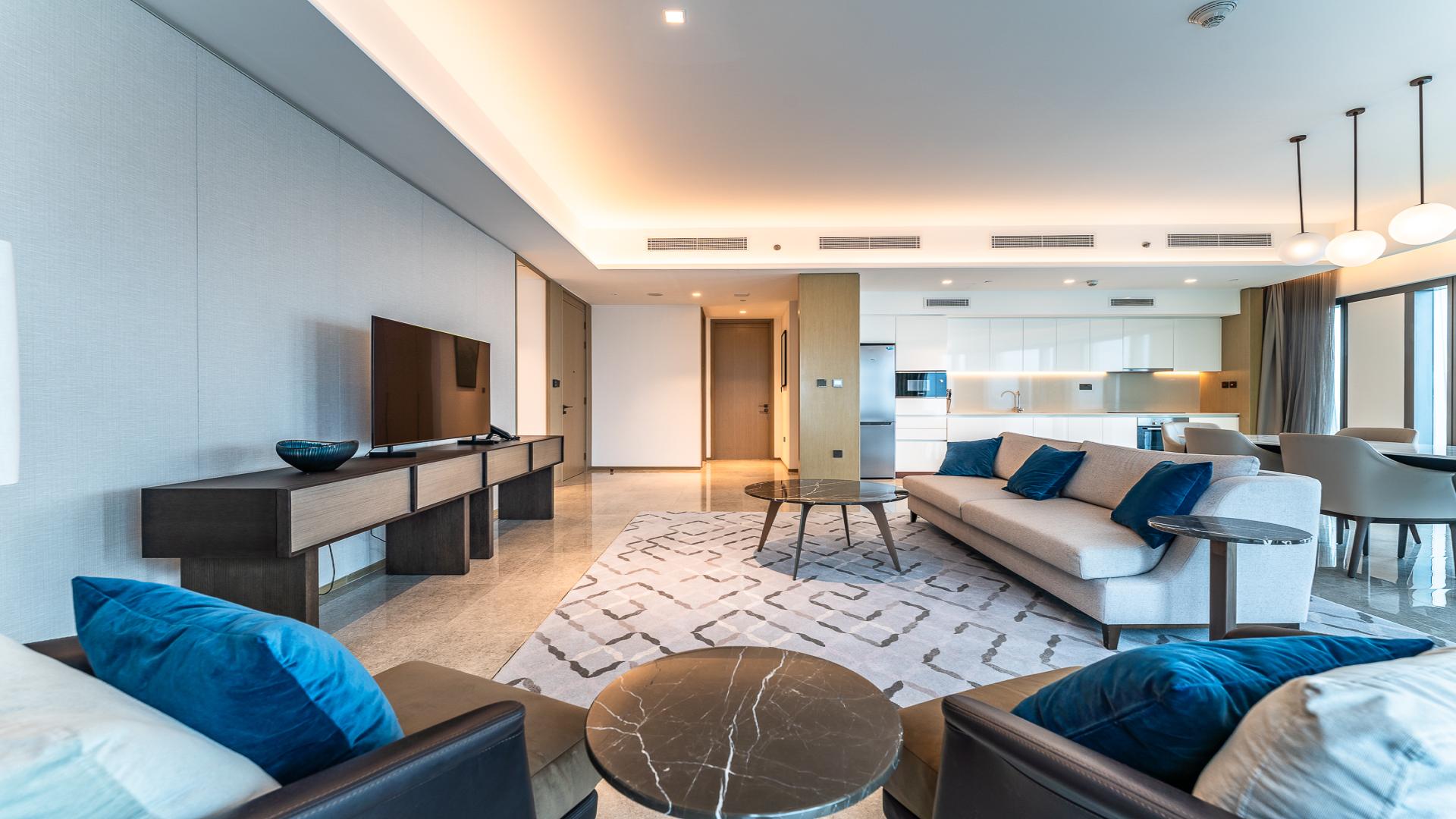 Modern living and dining area in Dubai Creek Harbour apartment for sale