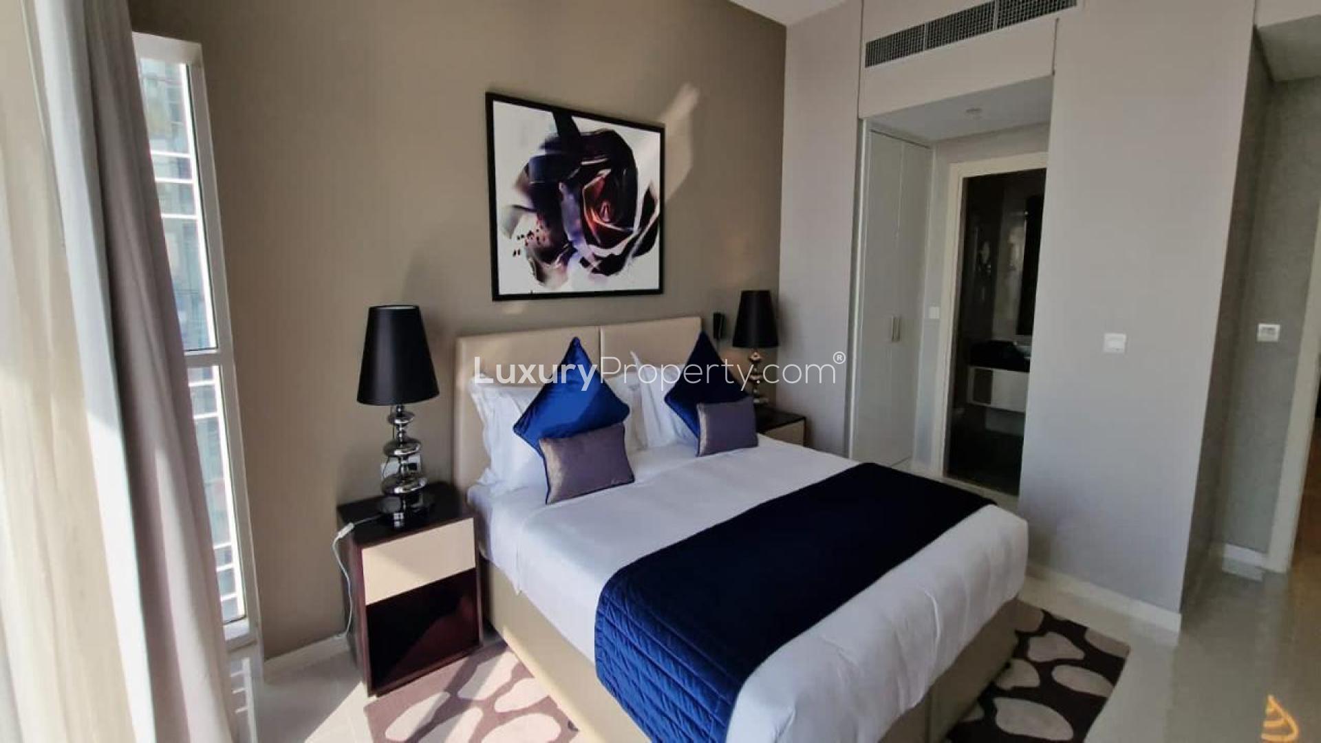 Bedroom interior in Artesia D apartment, Damac Hills. Modern design, neutral tones, stylish decor