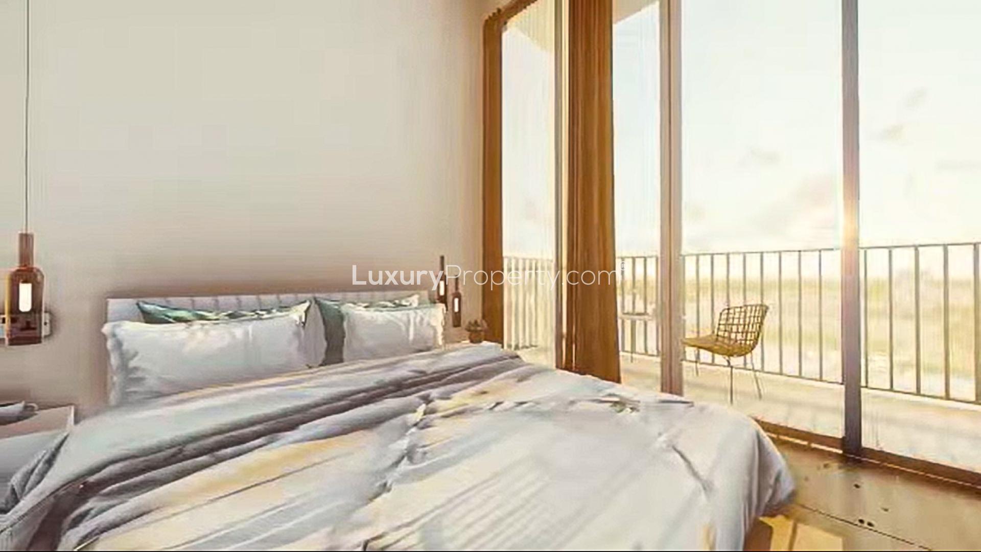 Modern bedroom in Messenger Crown apartment, Colombo 12, featuring cozy bed and workspace