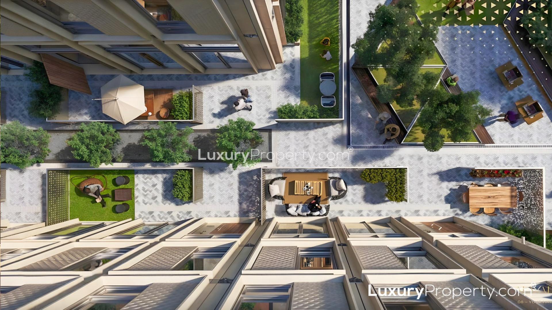 "Stunning night view of Expo City Dubai, highlighting Al Waha Residences architecture.",Aerial view of Al Waha Residences courtyard, Expo City apartment for sale, LP47987