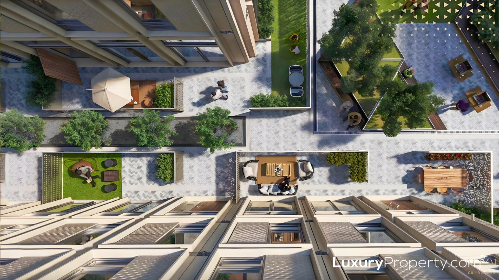 "Stunning night view of Expo City Dubai, highlighting Al Waha Residences architecture.",Aerial view of Al Waha Residences courtyard, Expo City apartment for sale, LP47987