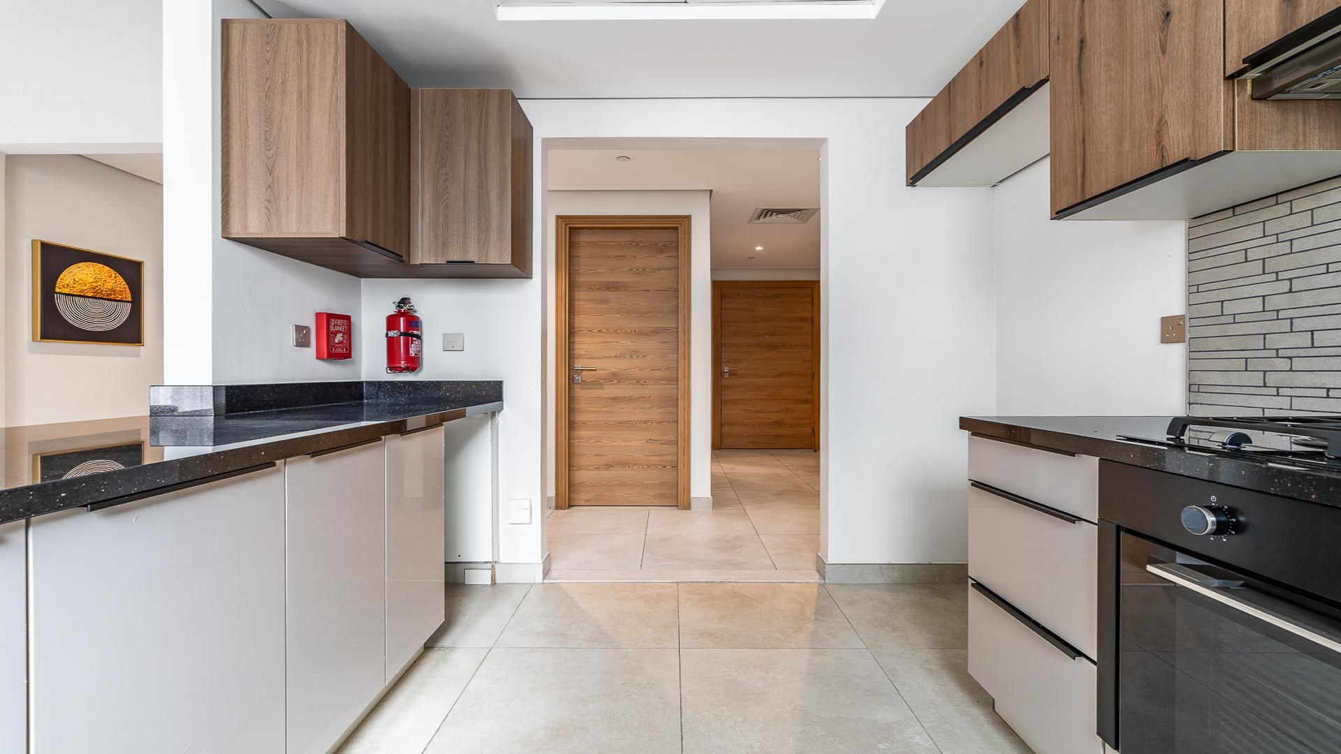 Modern JVC Eleganz apartment dining area with large windows and elegant decor for sale