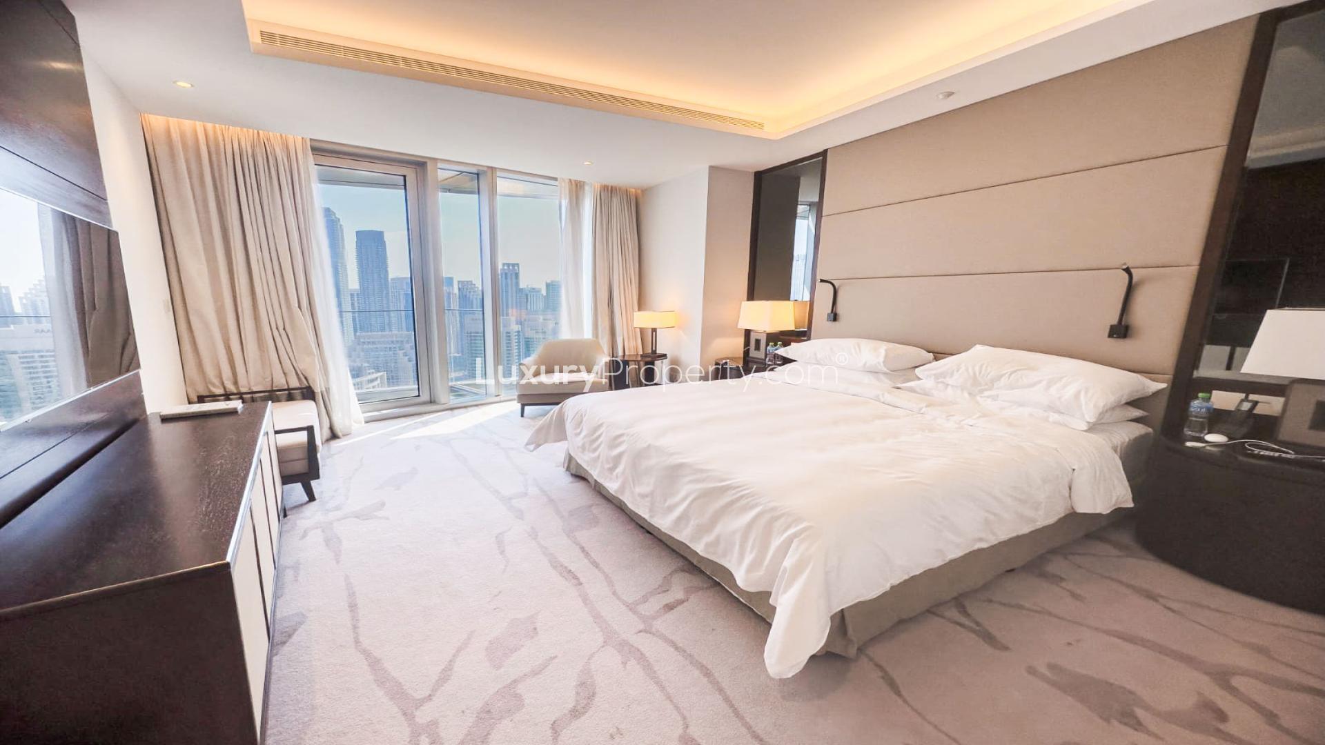 High-floor apartment hallway with modern wooden cabinetry in Address Residences Sky View, Downtown