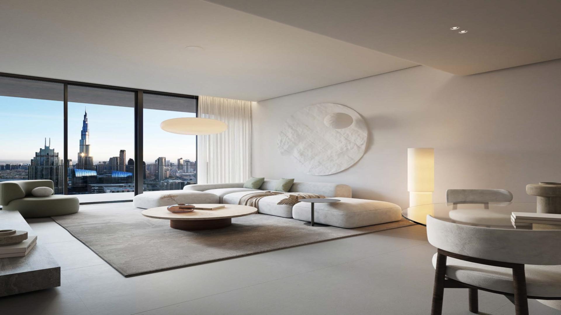 Modern living room in Akala Hotel apartment with city skyline view, DIFC, Dubai