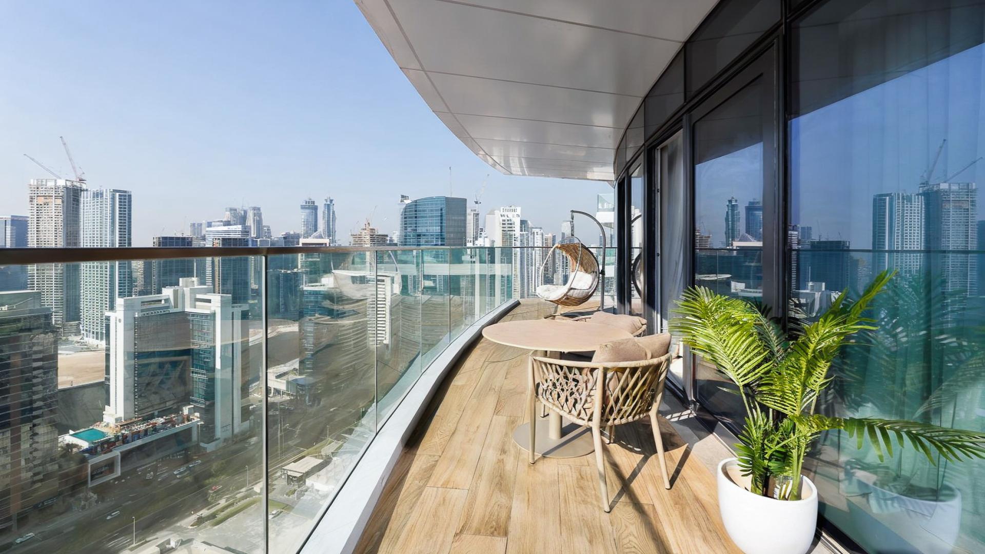 Stylish living room in furnished 2-bedroom apartment for sale, Imperial Avenue, Downtown Dubai