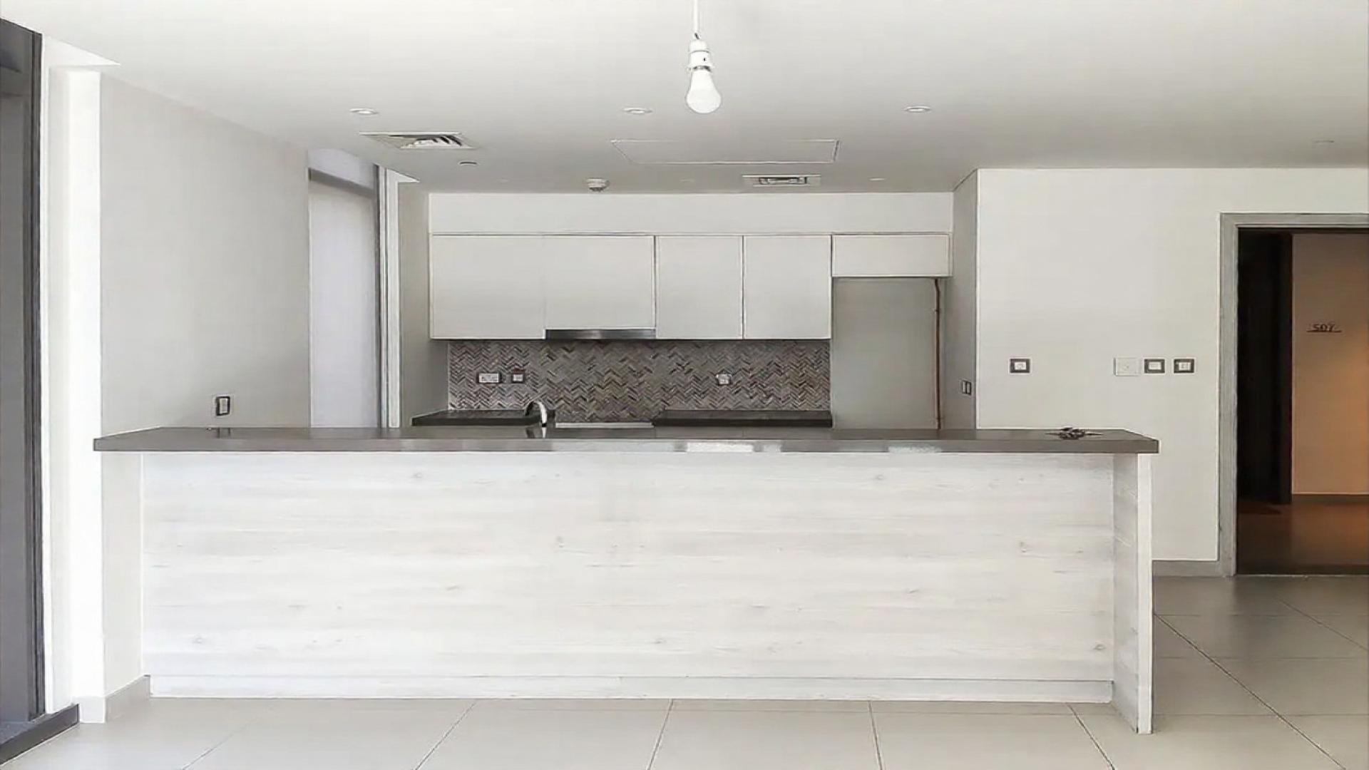 Modern kitchen in Dubai Creek Harbour apartment for sale, The Cove Building 1