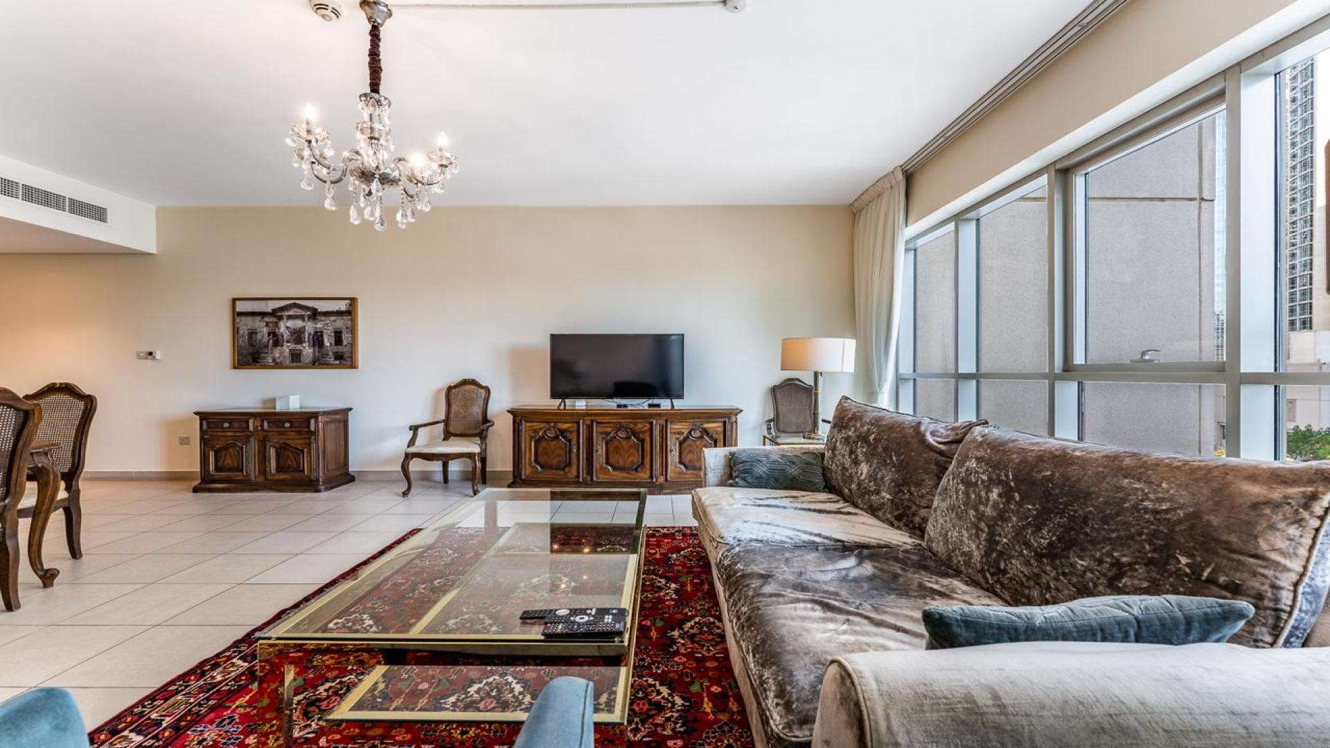 Modern living and dining area in 2-bedroom apartment, Boulevard Central Tower 1, Downtown Dubai