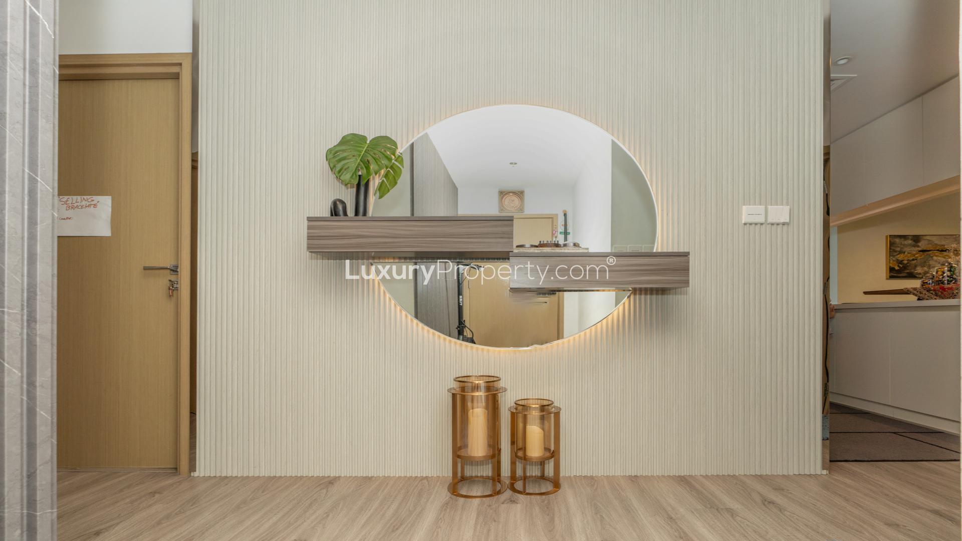 Modern living room in Creek Palace apartment, Dubai Creek Harbour, with balcony view