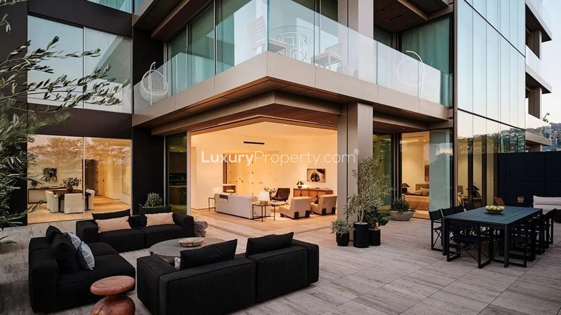 Modern open-plan kitchen and living area in West Hollywood apartment for sale