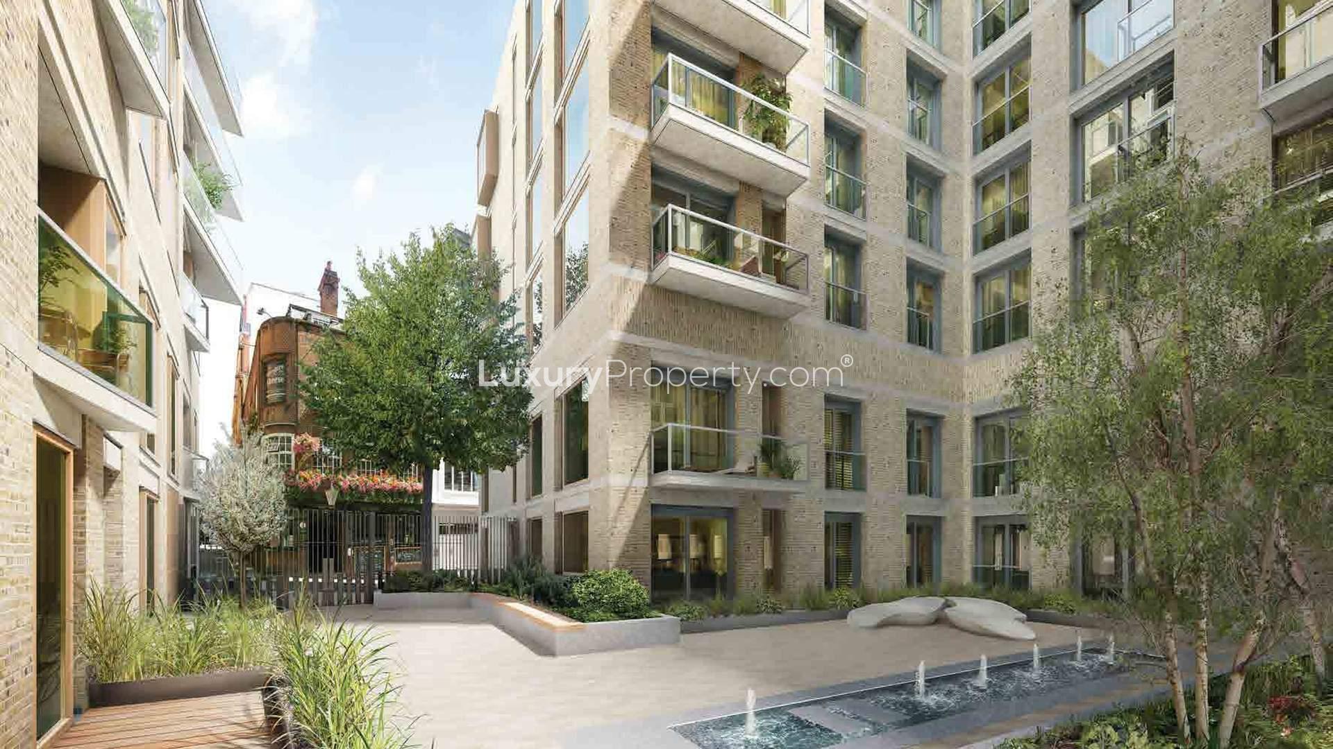 Luxurious apartment building at 190 Strand, Westminster, featuring modern architecture and lush greenery