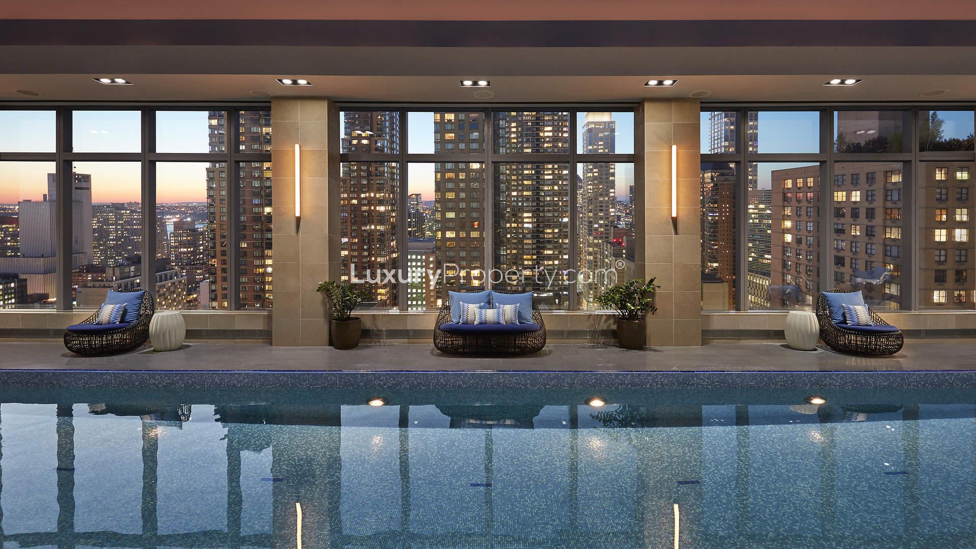 Luxury bedroom in modern Manhattan apartment with elegant decor and ample natural light