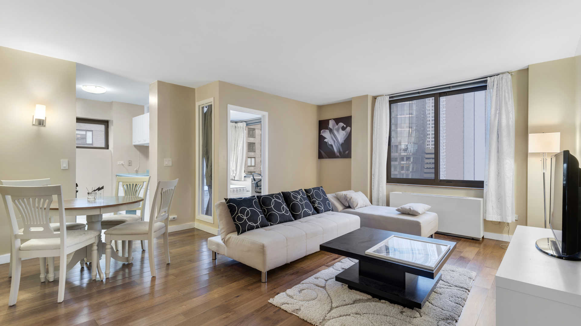 Modern bathroom in 2-bedroom apartment, Battery Park City, Manhattan. Marble sink and bathtub