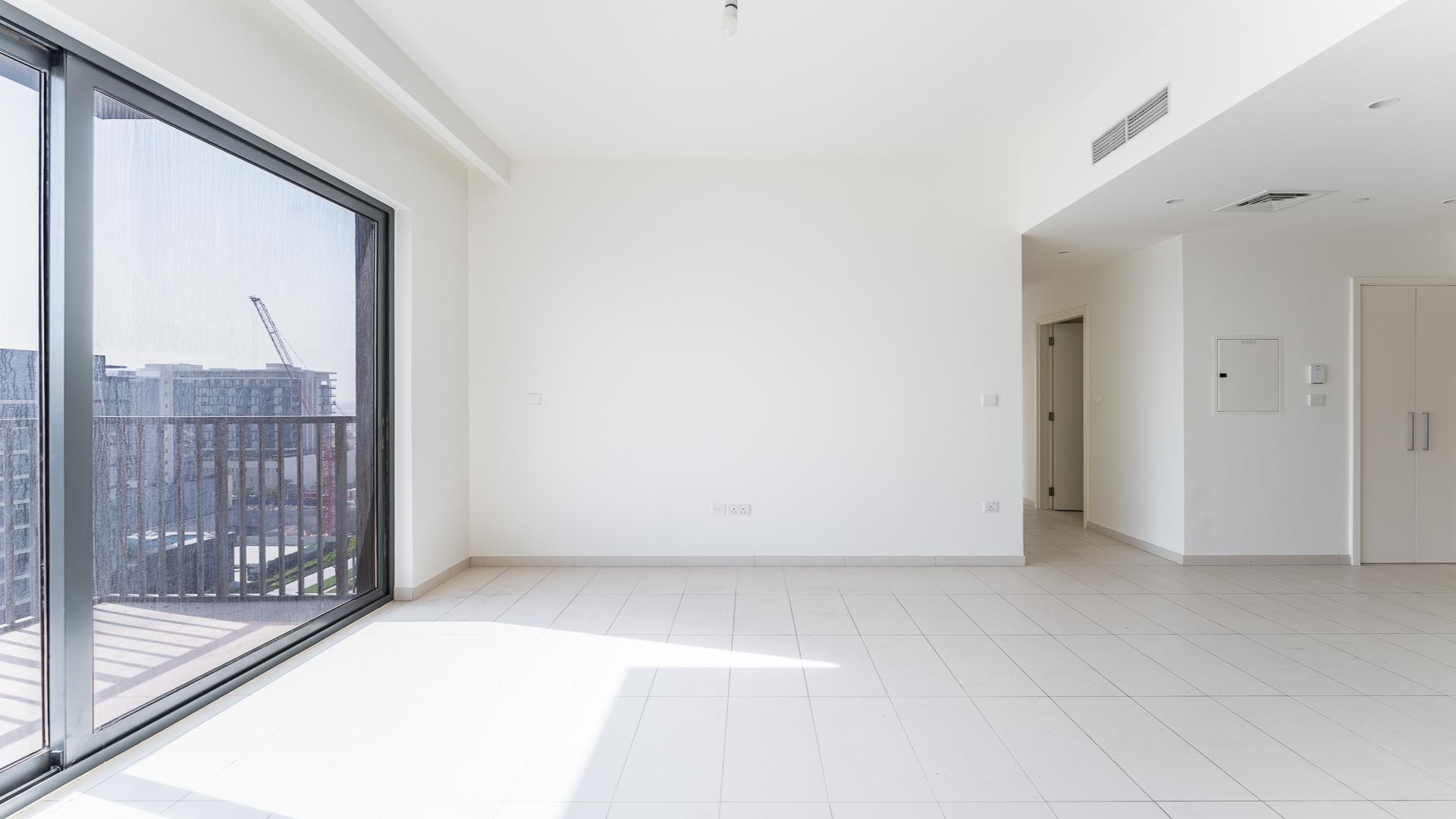 Modern kitchen and living area in vacant 2-bedroom apartment, Dubai Hills Estate