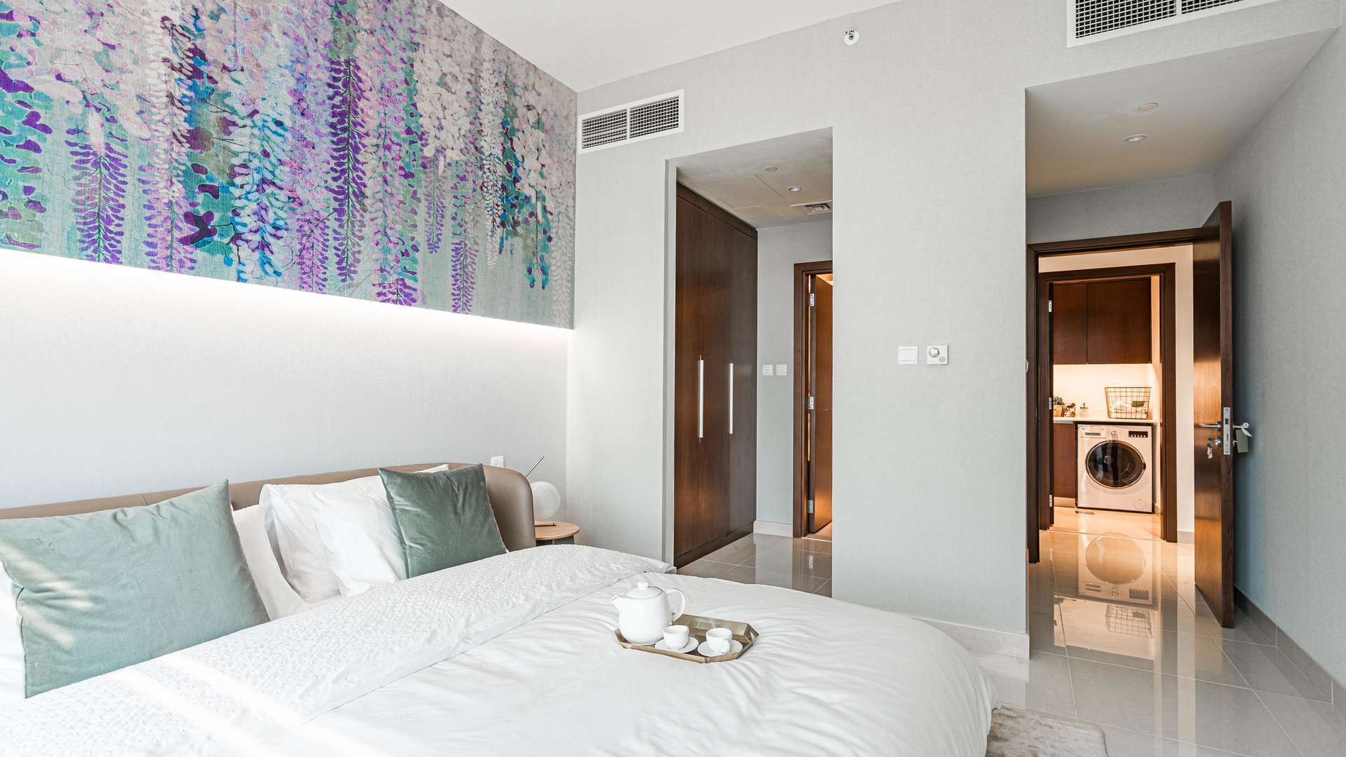 Modern kitchen with wooden cabinets in Dubai Hills Estate apartment, Acacia Park Heights