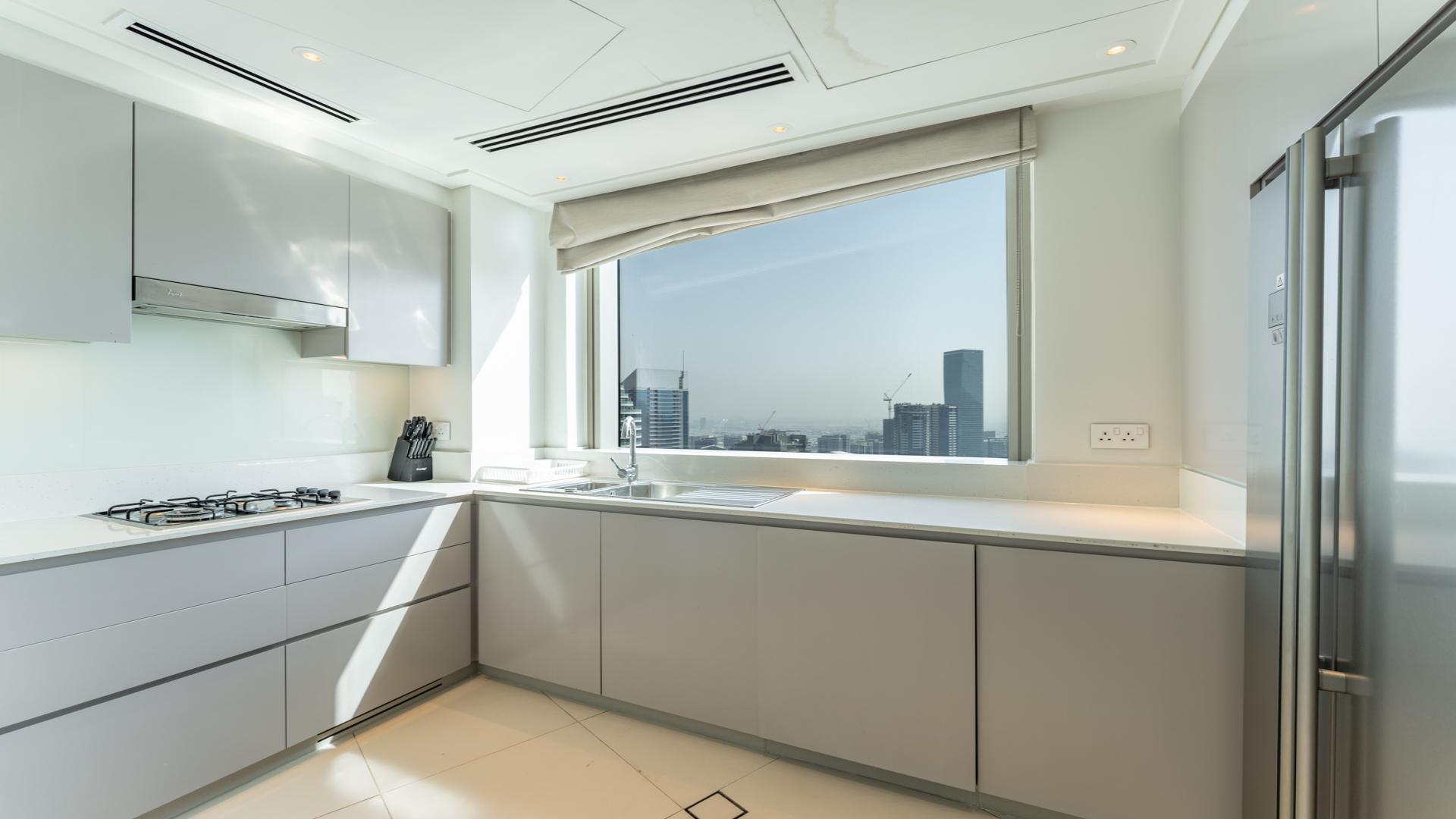 Skyline view of Downtown Dubai with Burj Khalifa from Vida Residence apartment balcony