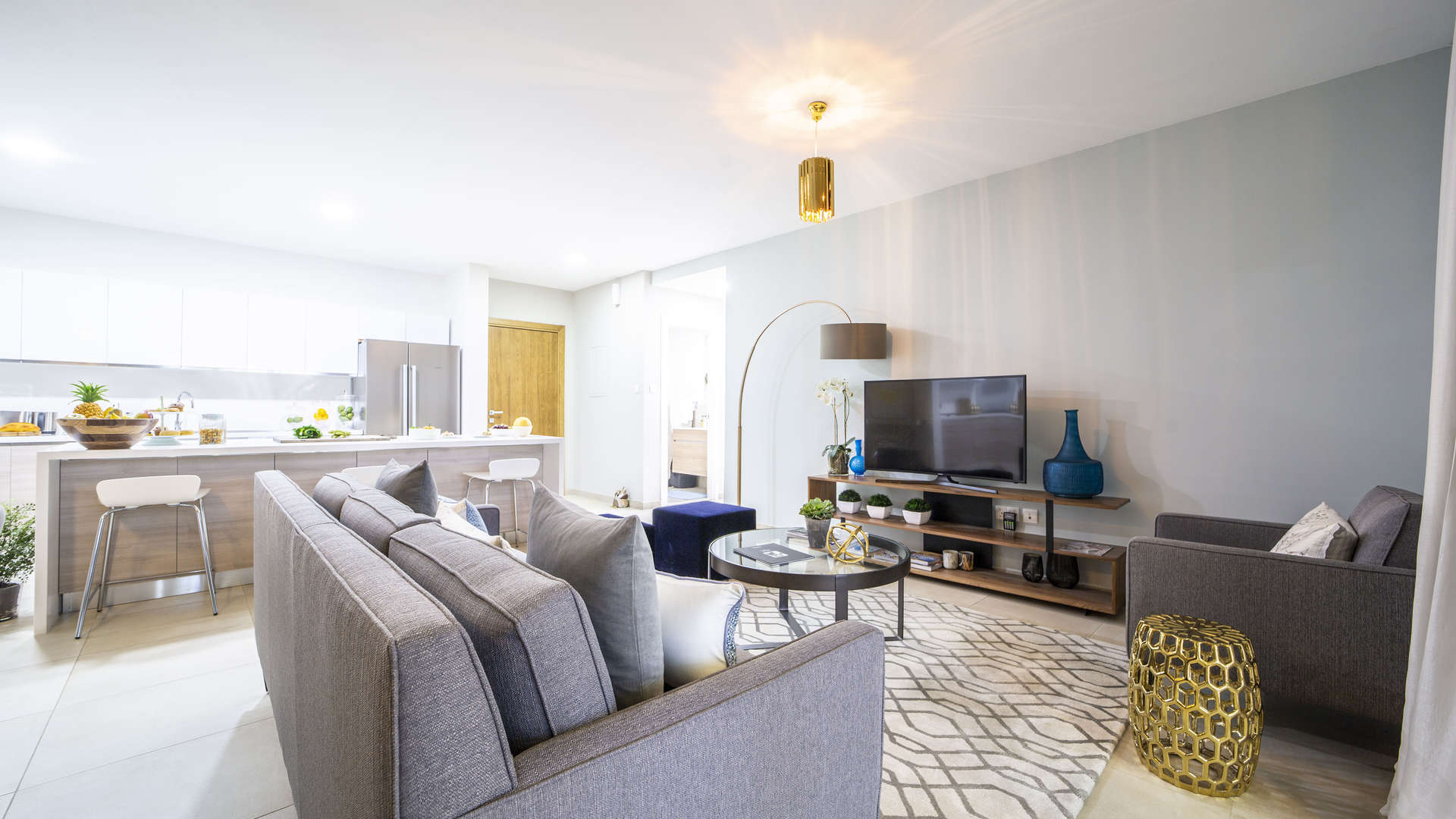 Hallway leading to modern kitchen in Al Andalus Tower A apartment, JGE