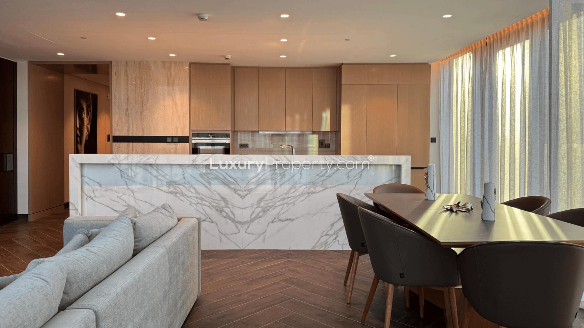 Modern living room in renovated One Zabeel Tower apartment, featuring elegant furnishings and decor