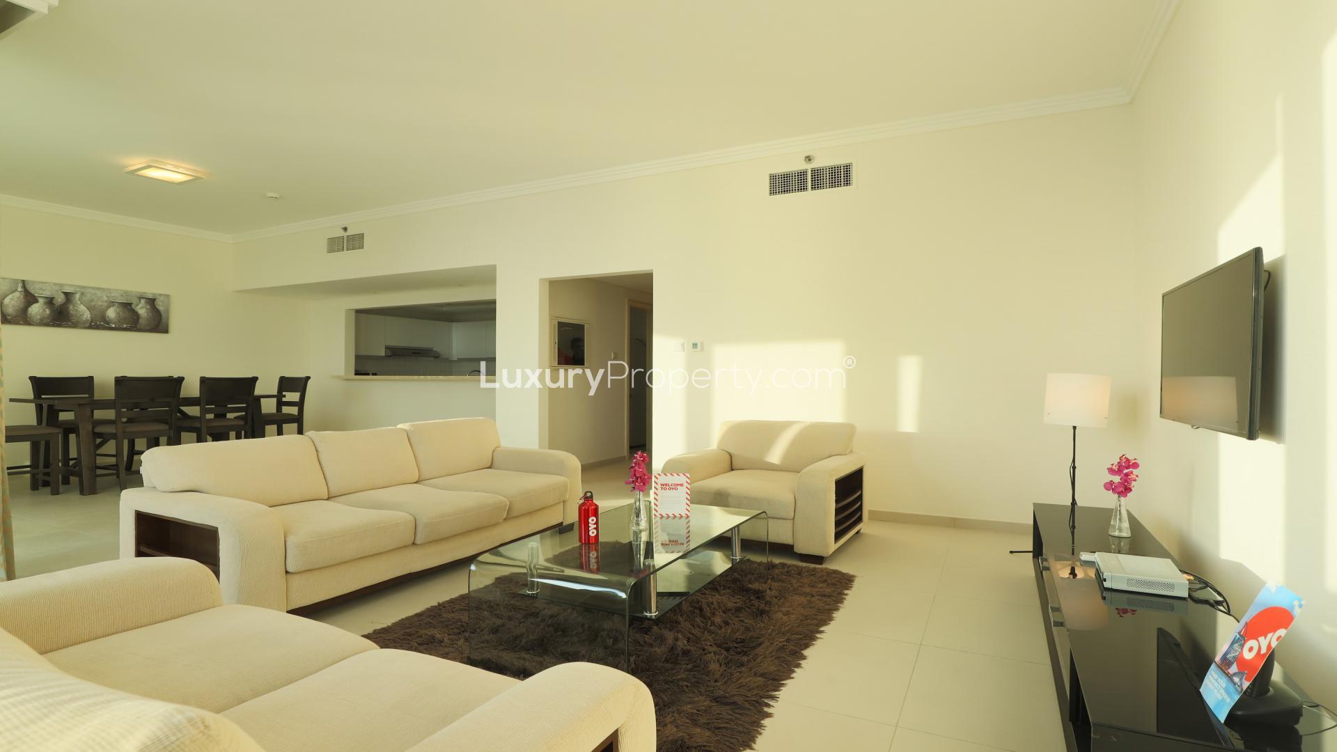 Bright living room in upgraded Jumeirah Beach Residence apartment, Al Bateen Residences for sale