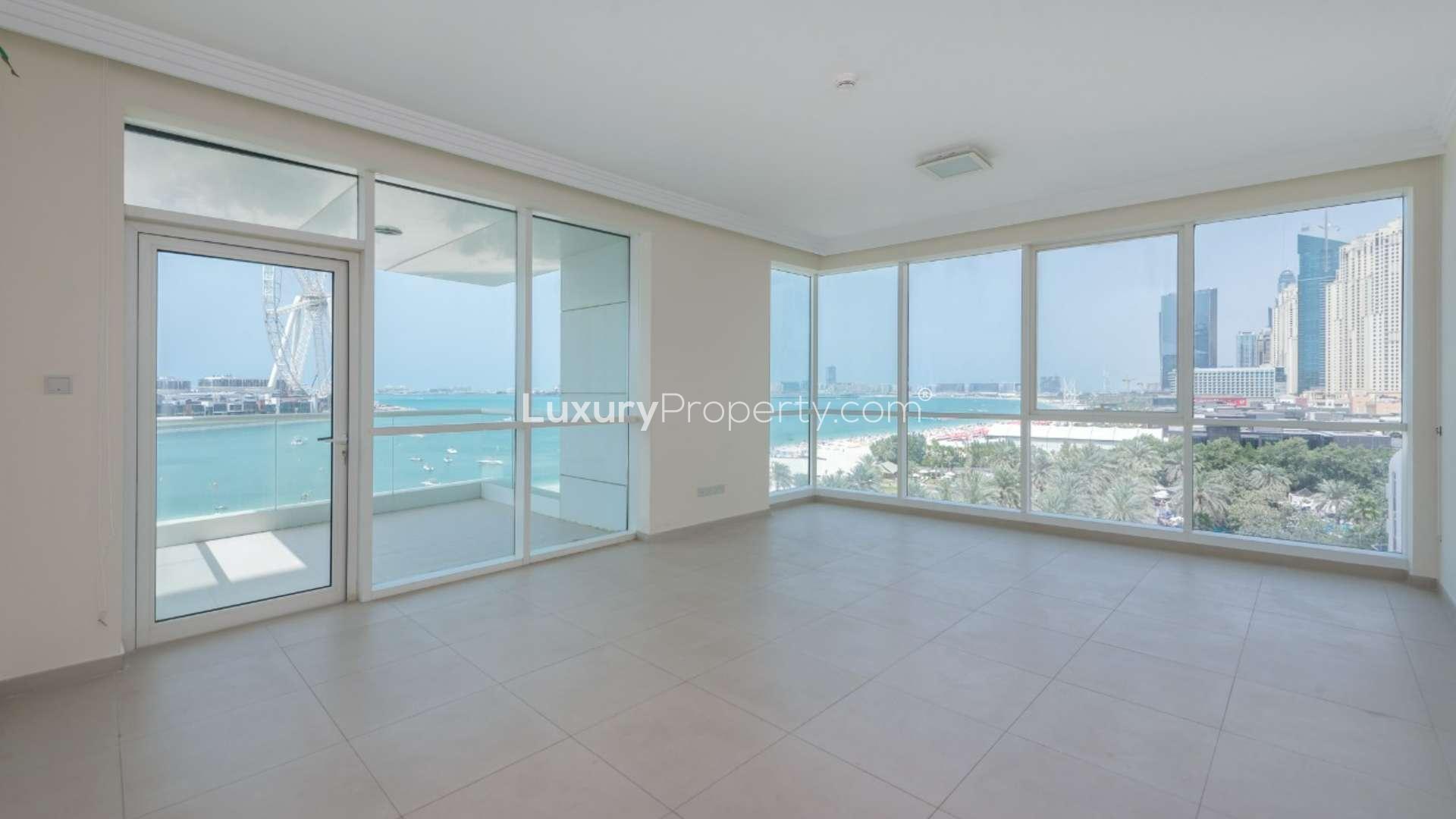 "Stunning Ain Dubai view from Al Bateen Residences apartment, Jumeirah Beach Residence balcony.","Spacious apartment with Ain Dubai view, Jumeirah Beach Residence, Al Bateen Residences.",Modern kitchen with Ain Dubai view, Al Bateen Residences, Jumeirah Beach Residence apartment