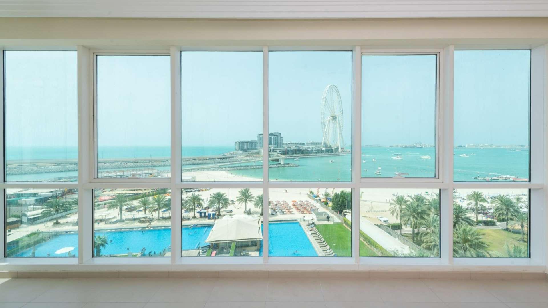 Ain Dubai view from Al Bateen Residences apartment, Jumeirah Beach Residence, pool and beach scene
