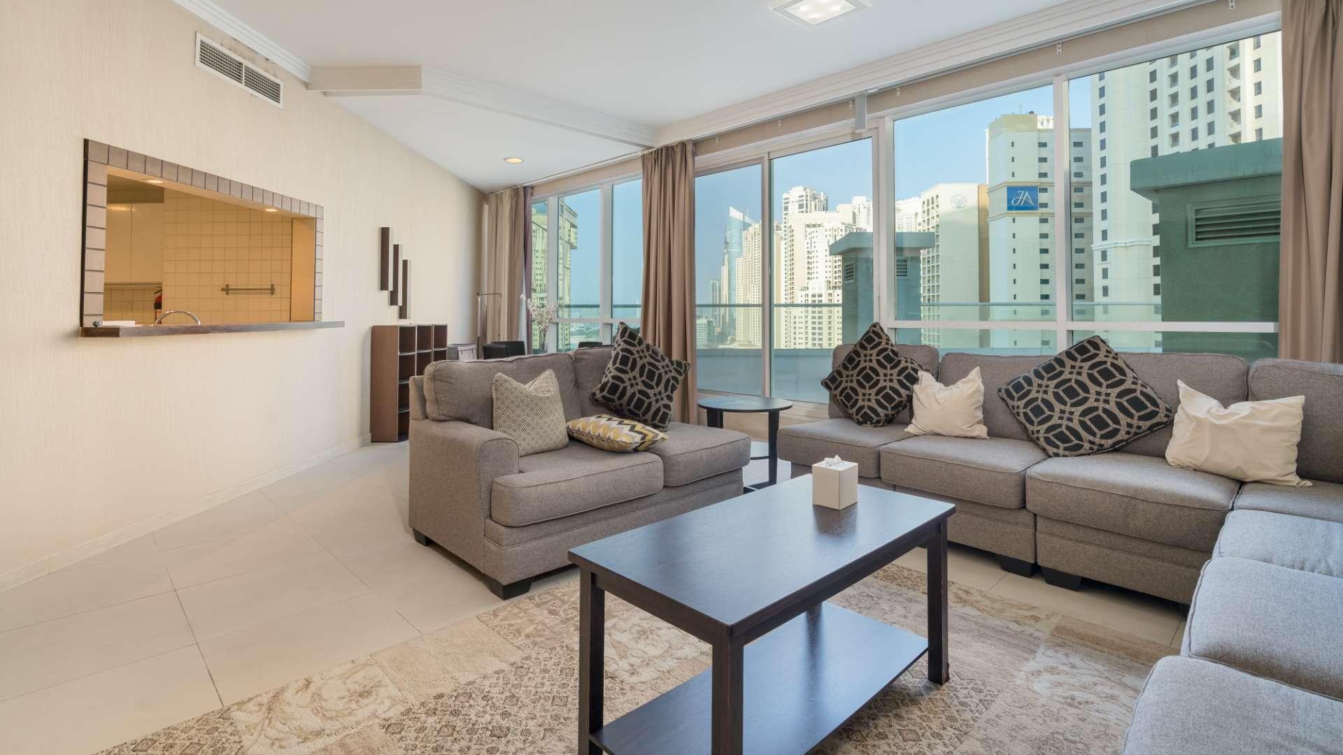 Luxurious living room in 2-bedroom Al Bateen apartment, JBR, with modern furnishings