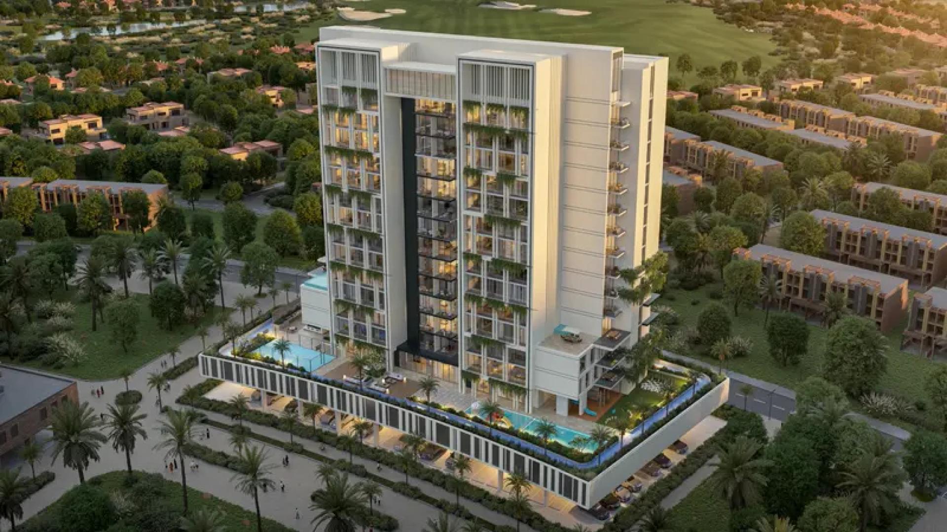 "Elegant lobby of Fairway Residences in Dubai Sports City, featuring modern design and decor.",Aerial view of Fairway Residences, Dubai Sports City apartment building surrounded by greenery