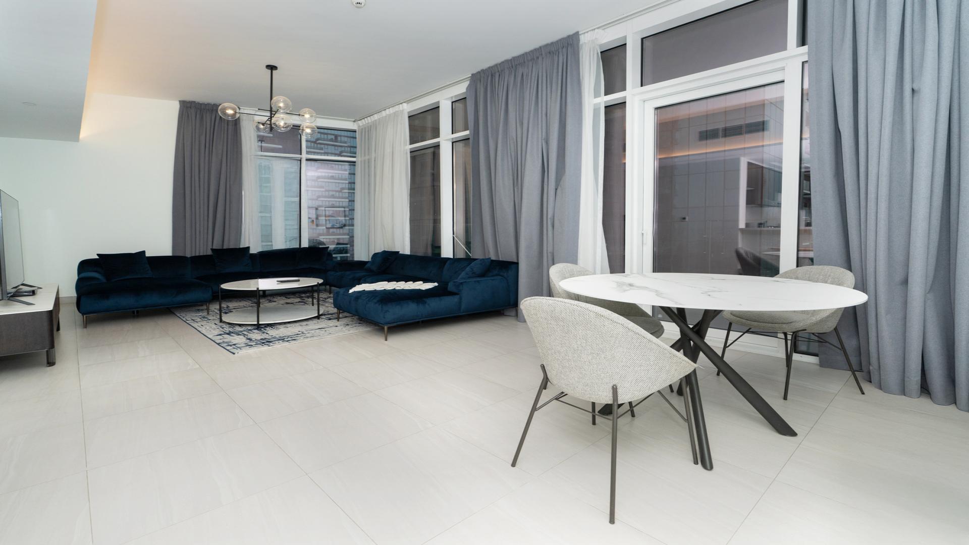 Fully furnished living area with open kitchen in Park Gate Residences, Al Kifaf apartment