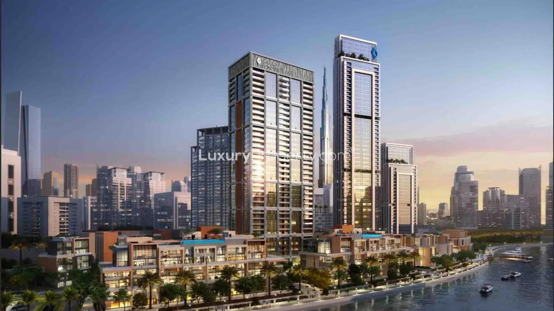 "Peninsula Two Business Bay apartment with canal view, stunning skyline at sunset.","Luxury canal-view apartment in Peninsula Two, Business Bay skyline at sunset, for sale.",Prime 2-bedroom apartment exterior with canal view in Peninsula Two, Business Bay