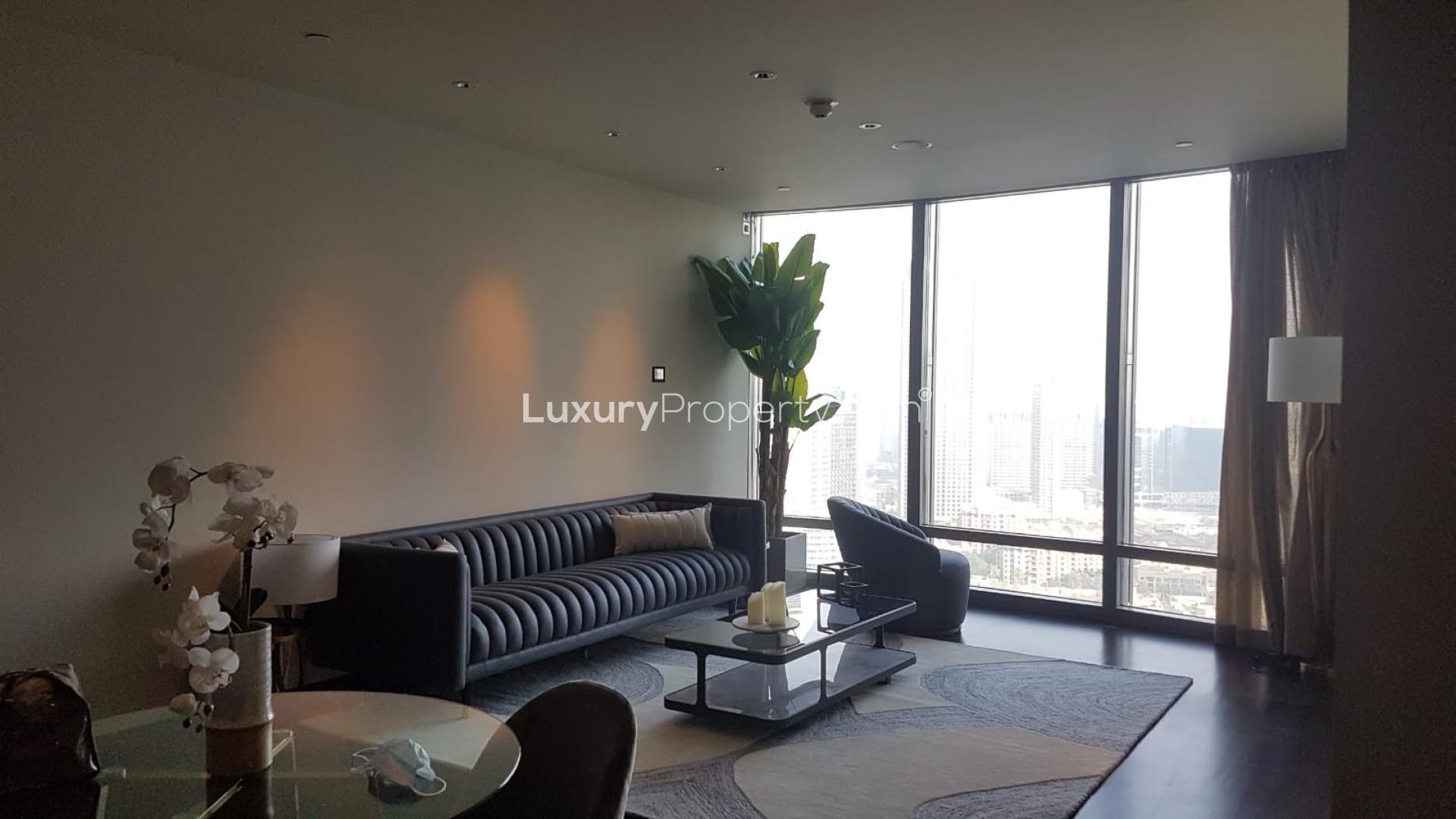 Modern apartment interior with large windows in Burj Khalifa Area, Downtown Dubai, for sale
