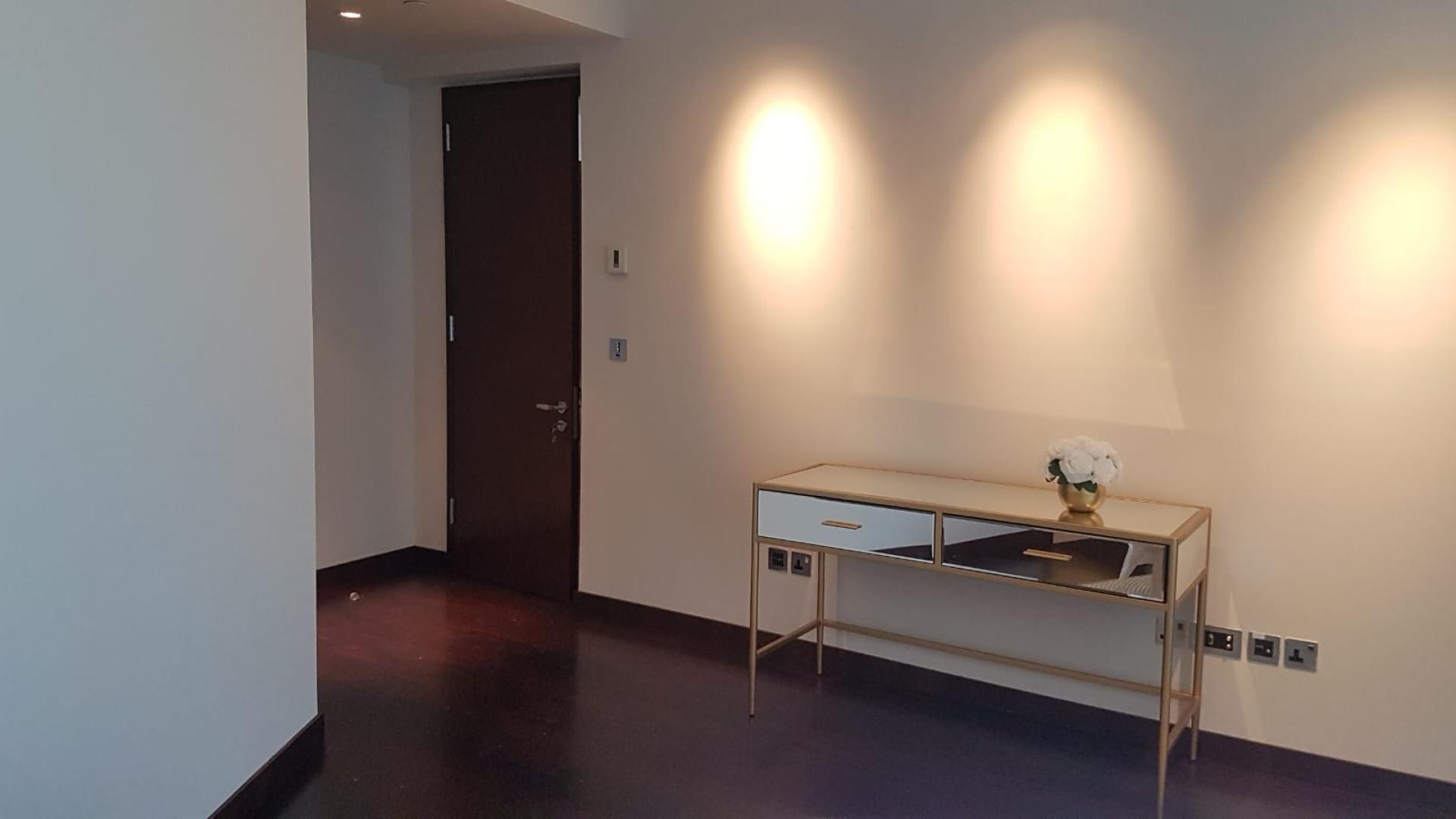 Modern living room in Burj Khalifa Area apartment, Downtown Dubai, with city view