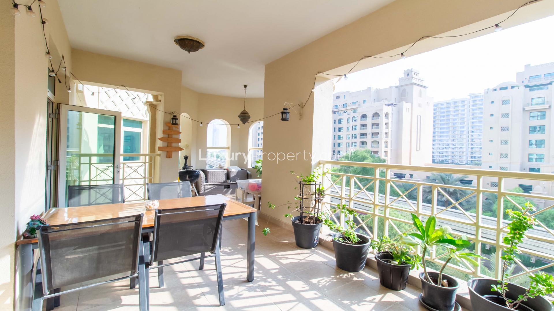 Living room in 2-bedroom Shoreline apartment, Palm Jumeirah, with modern decor and natural light