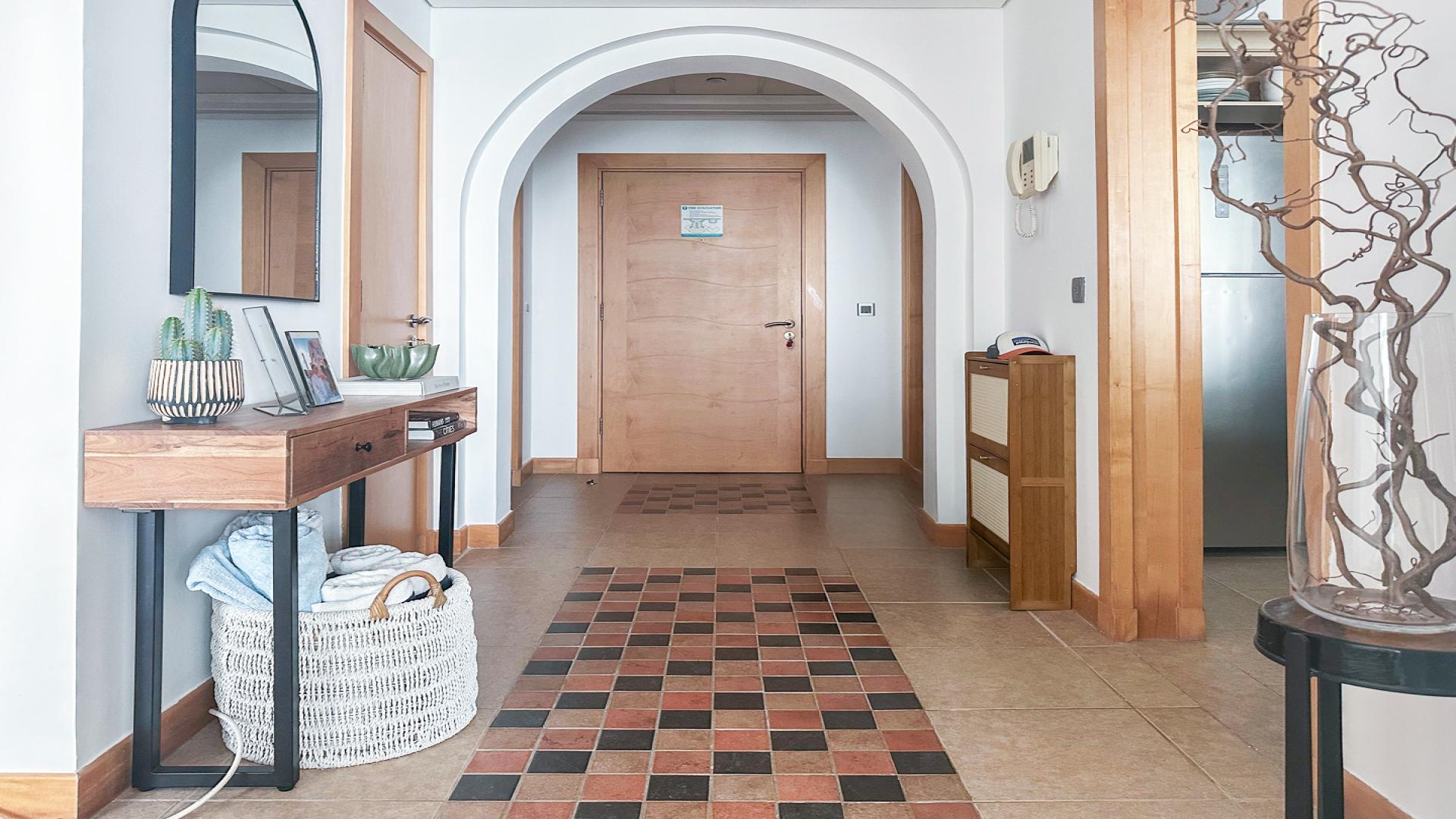 Balcony view of Palm Jumeirah shoreline apartment for sale, overlooking the sea and beach