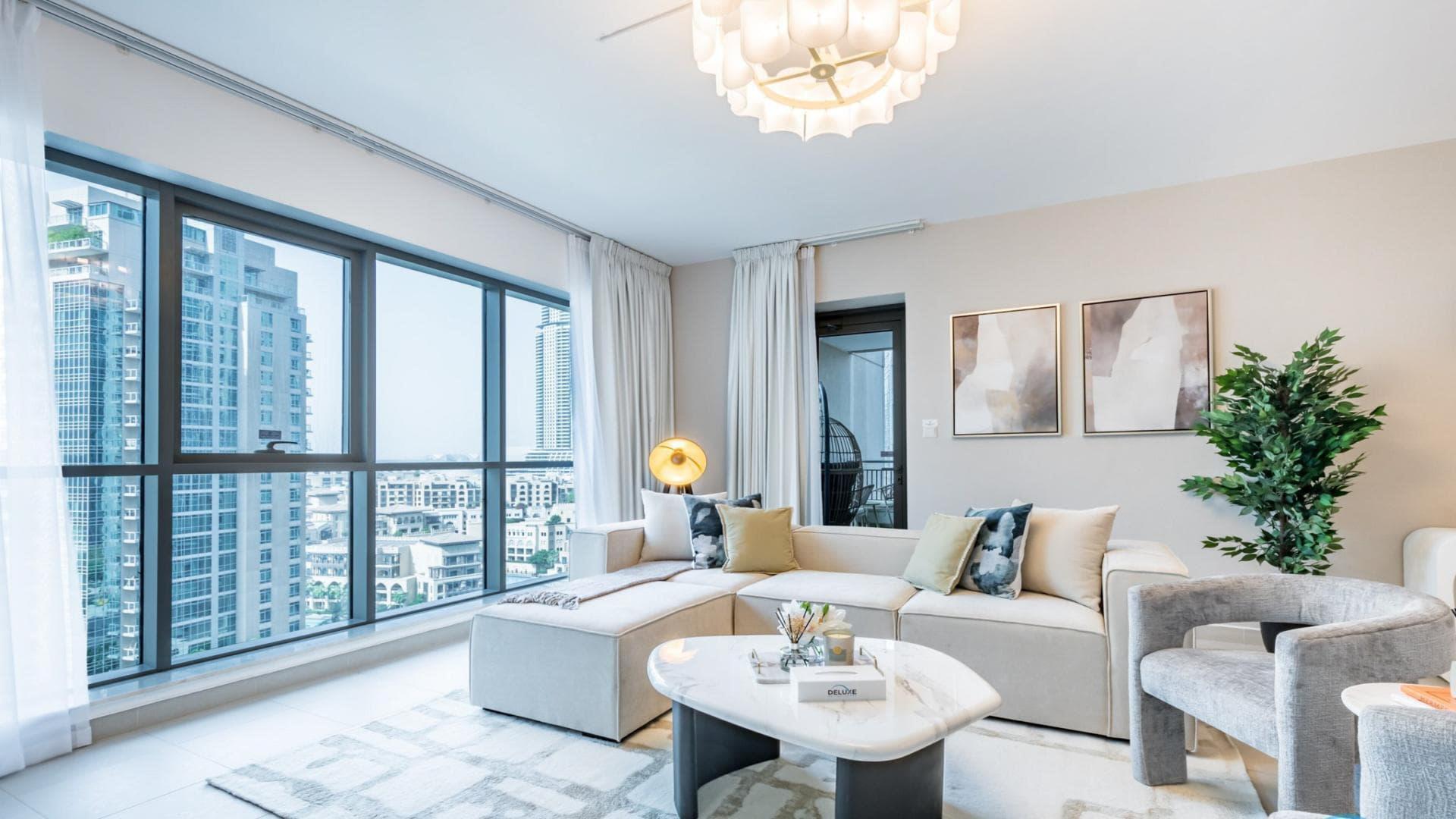 Modern living and dining area in Downtown Dubai apartment, Boulevard Central Towers