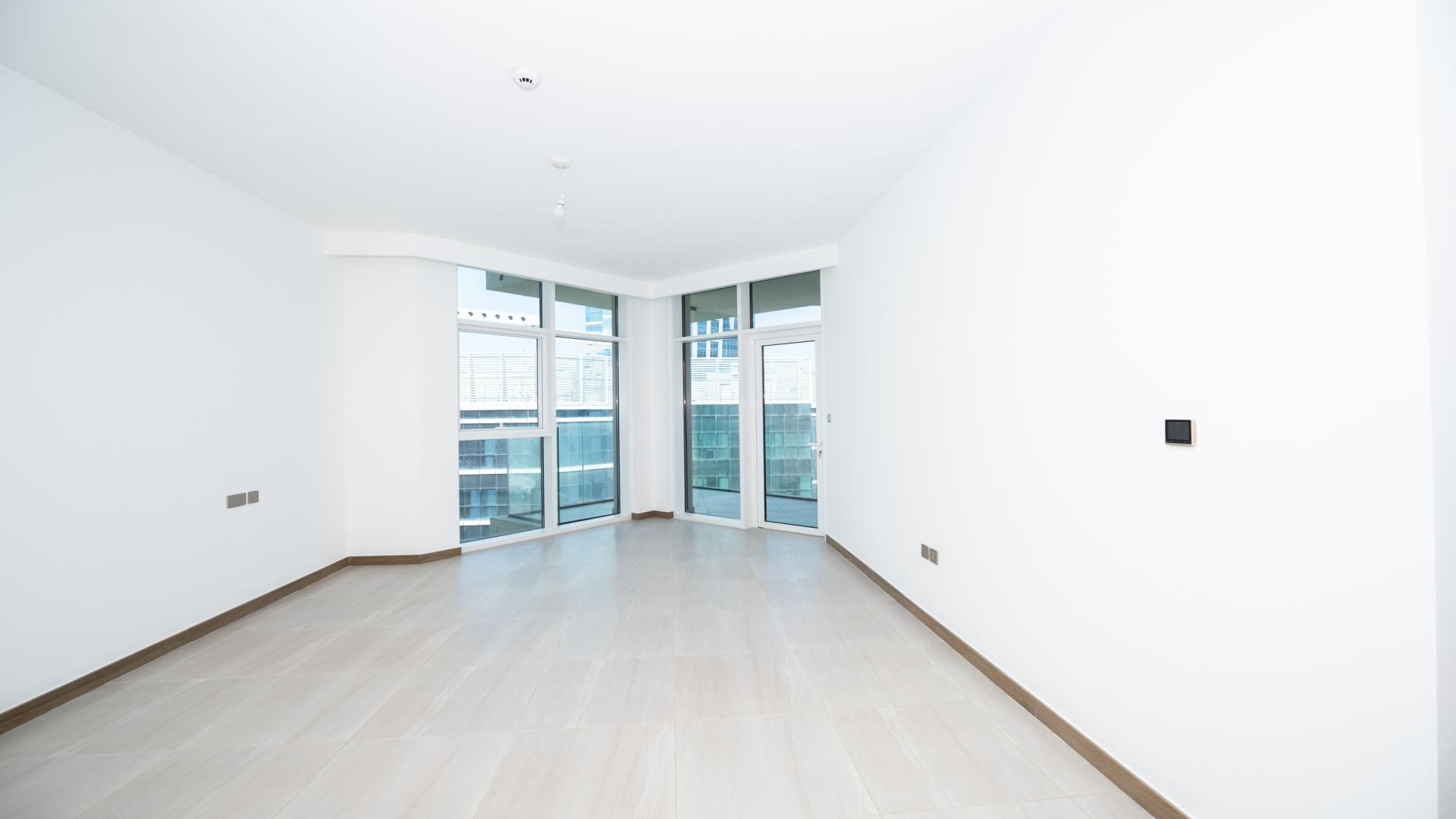 Balcony view from 2-bedroom apartment in Business Bay's Urban Oasis, showcasing city skyline