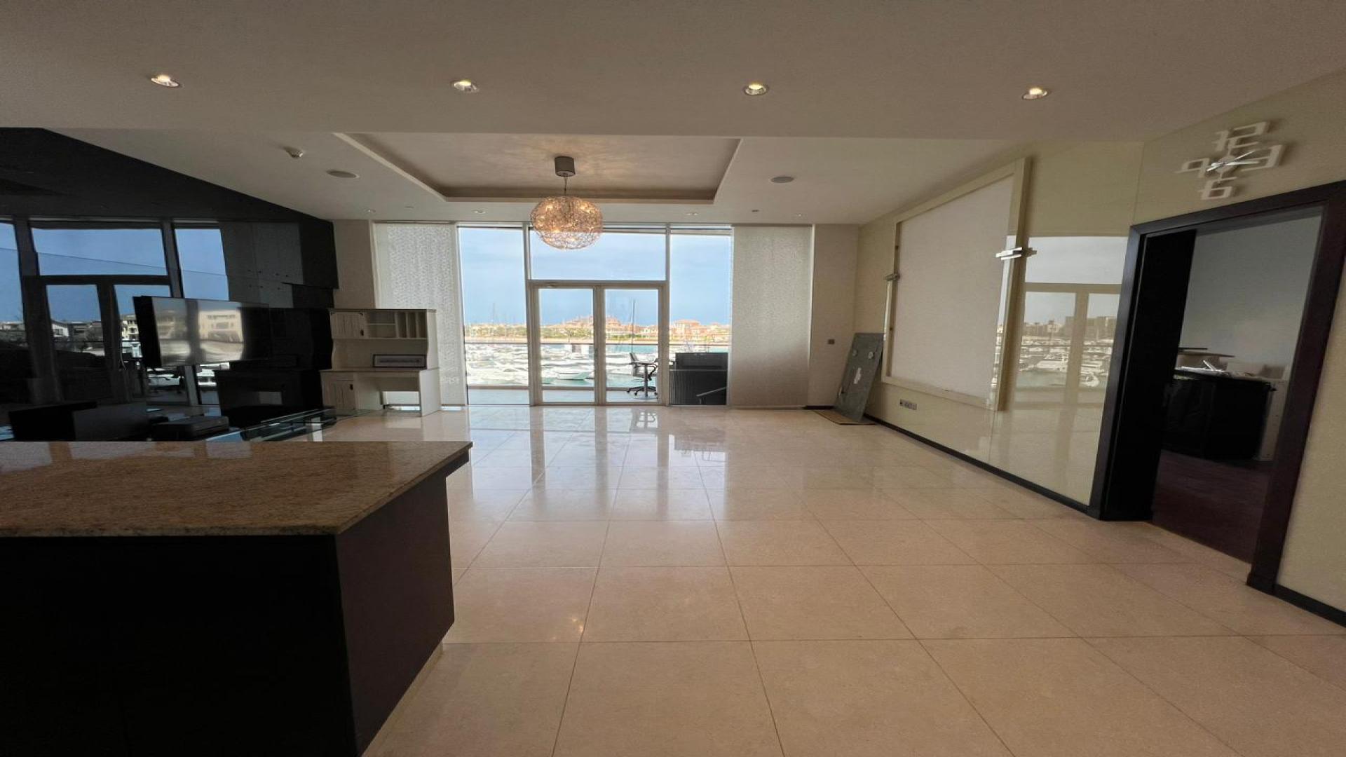 Balcony view of marina and yachts at Tiara Residences, Palm Jumeirah apartment for sale