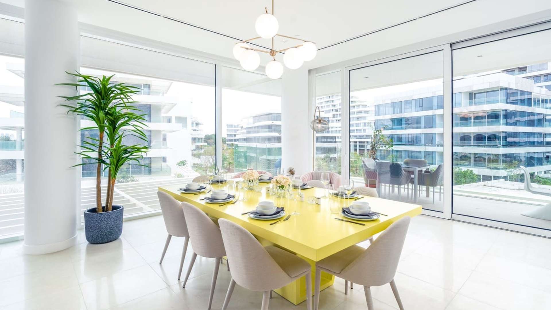 N/A,Bright dining area in Ashjar, Al Barari apartment with modern decor and large windows