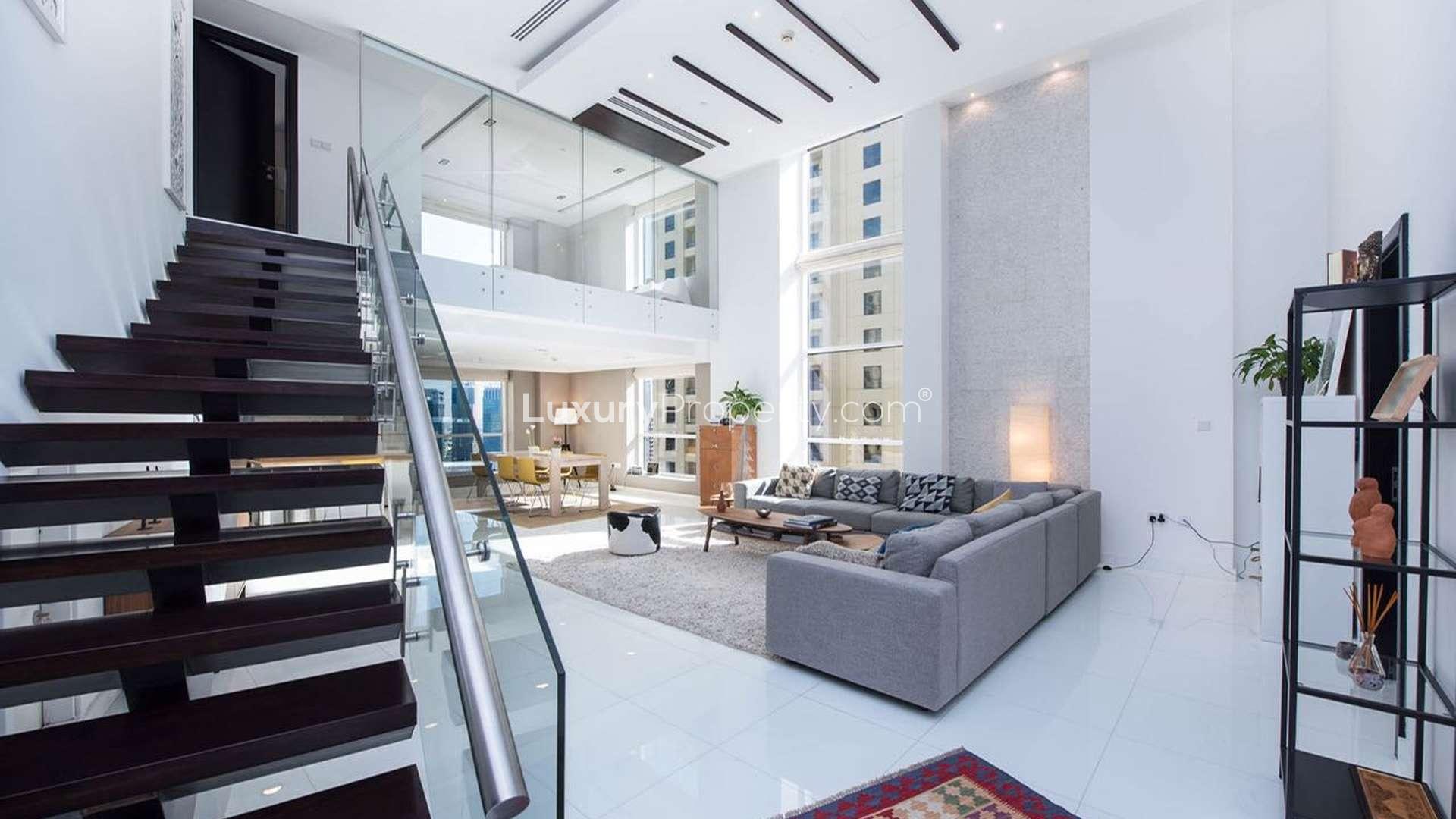 New York-style loft bedroom with modern design in Bahar, JBR, featuring skyline views