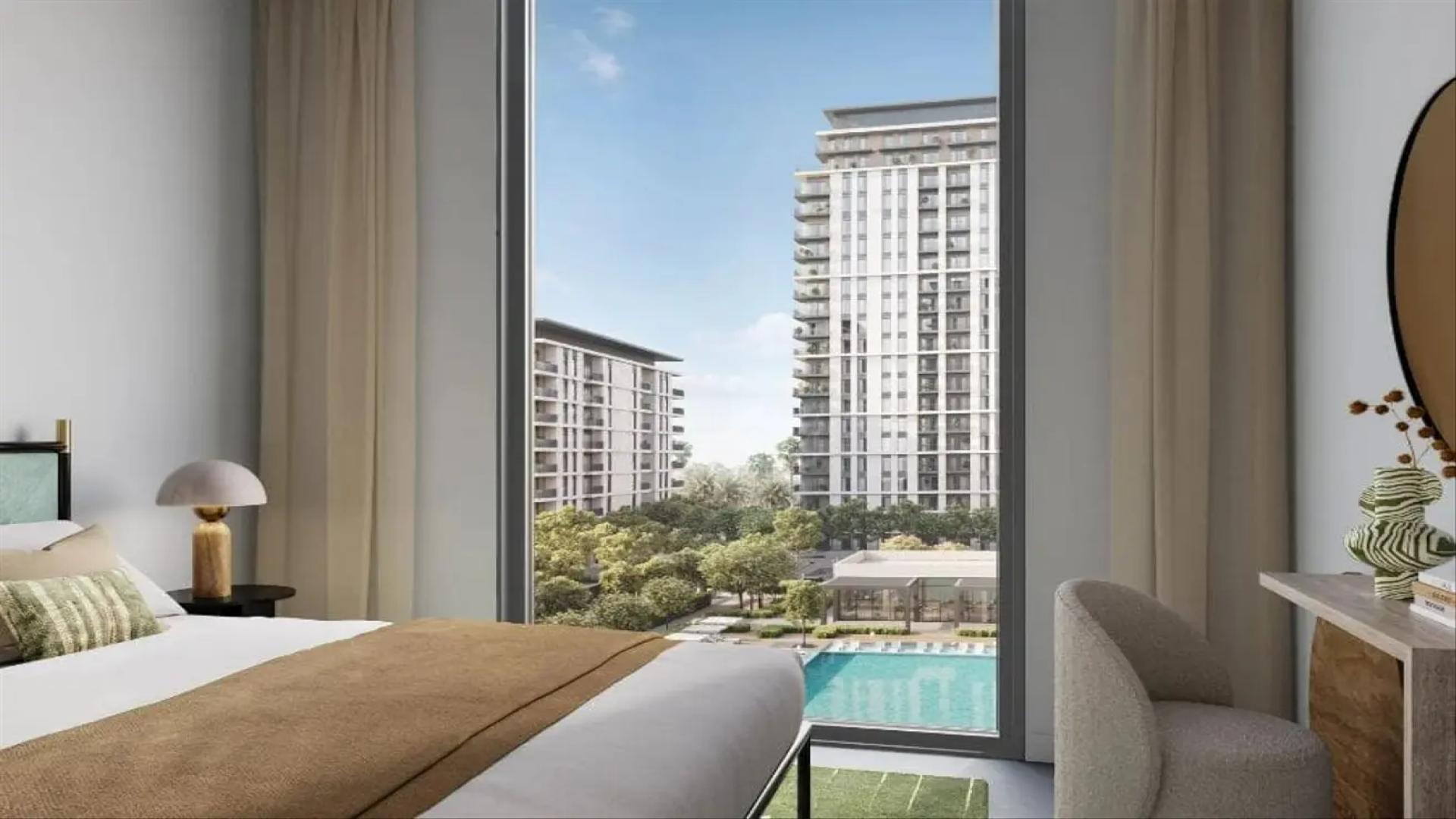 Modern kitchen with dining area in two-bedroom apartment, Park Lane, Dubai Hills Estate