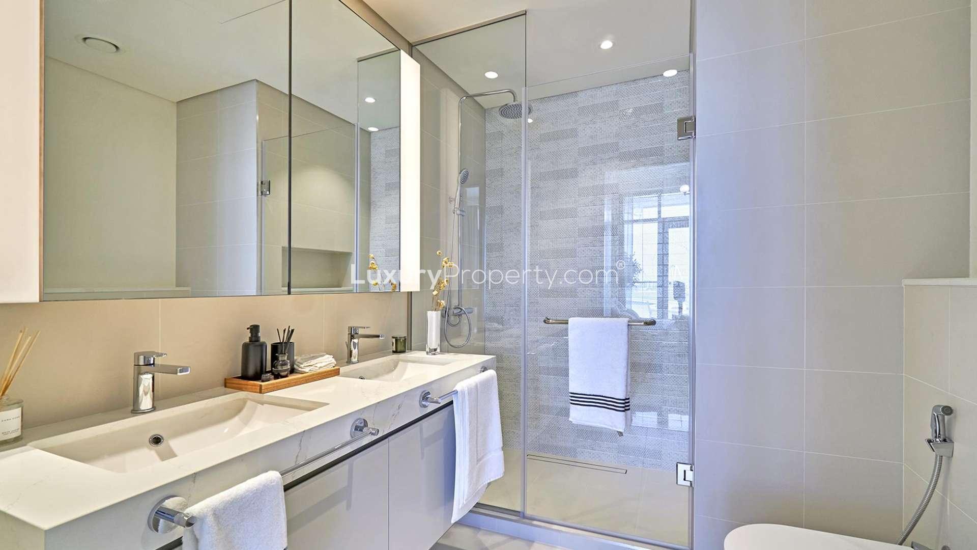 Stunning 2-bedroom apartment living area with panoramic Dubai Harbour skyline view, Emaar Beachfront