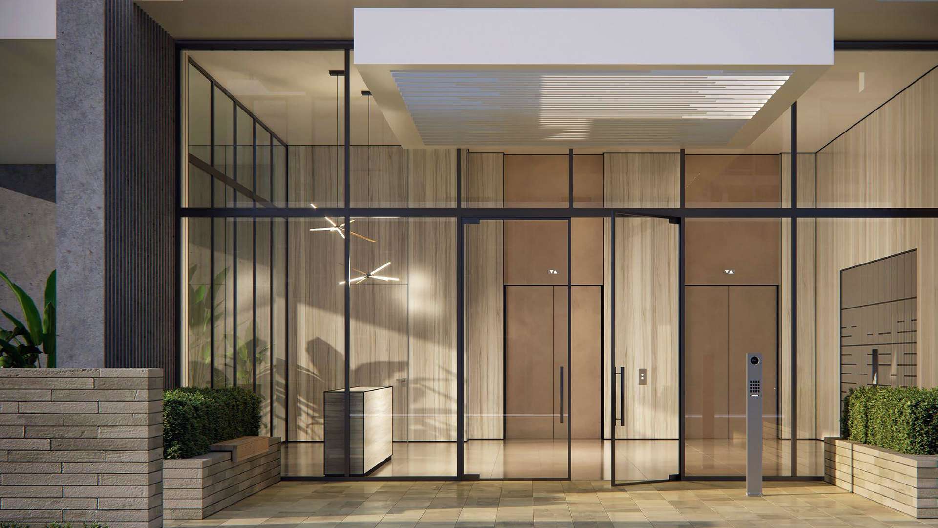 Luxurious beachfront apartment complex at sunset in Tilal Al Ghaf, Beachside Residences 3