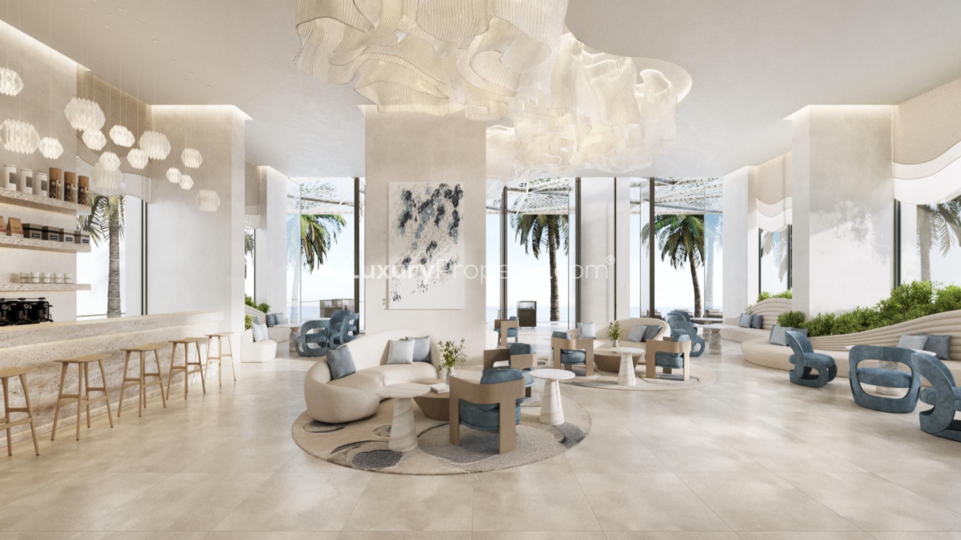 "Stylish 2-bedroom Nikki Beach apartment with pool, Al Marjan Island, RAK, for sale.",Luxurious lounge area in Nikki Beach Apartment, Al Marjan Island, with modern decor and seating