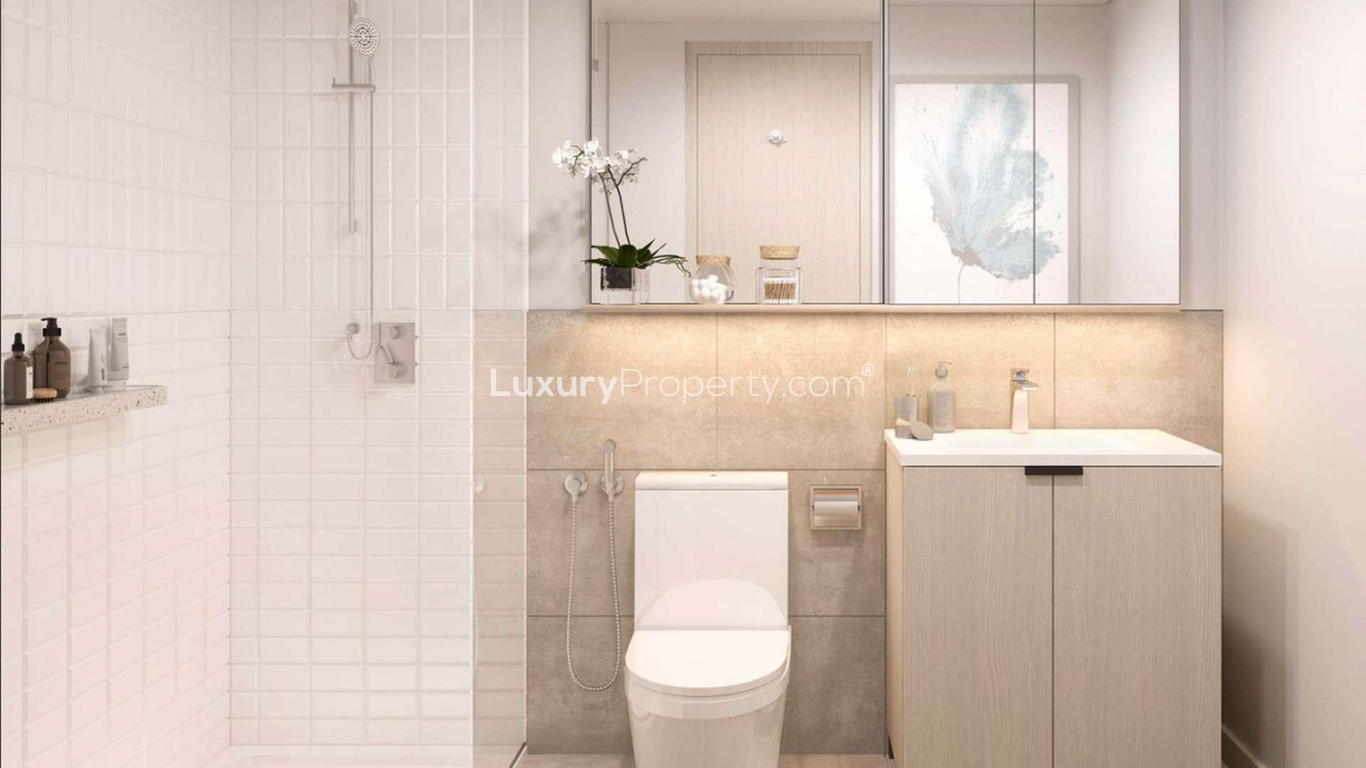 Modern bathroom in 2-bedroom apartment, Belgravia Heights I, JVC, featuring sleek fixtures