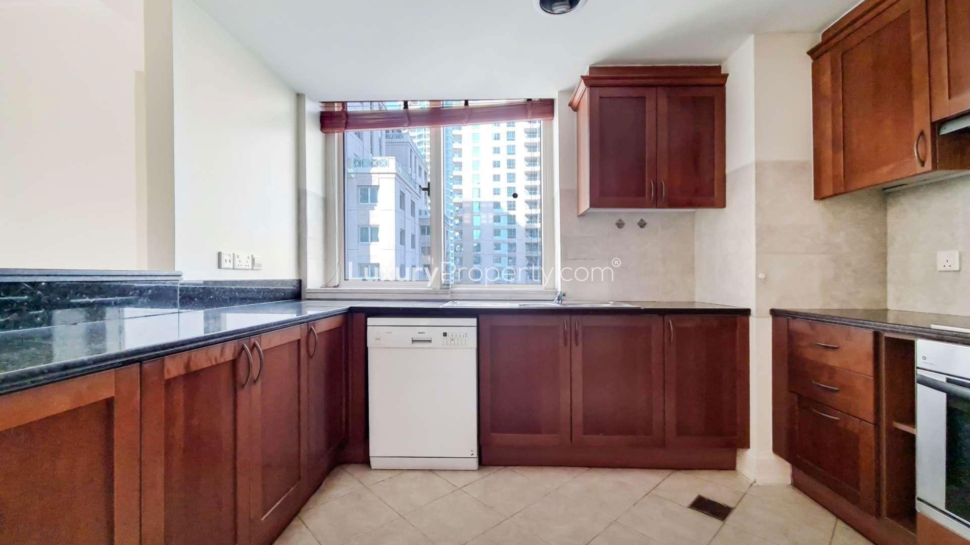 Empty living room with tiled flooring in Al Mesk Tower apartment, Dubai Marina