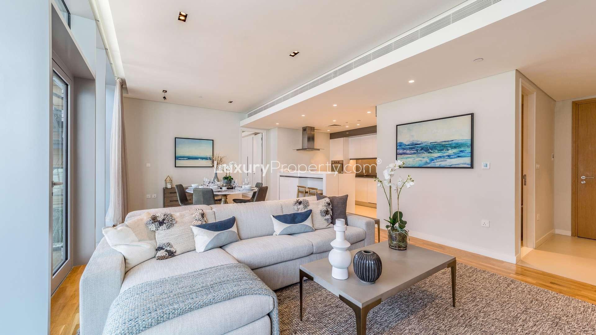 Modern bedroom in two-bedroom apartment, Bluewaters Island, featuring stylish decor and natural light
