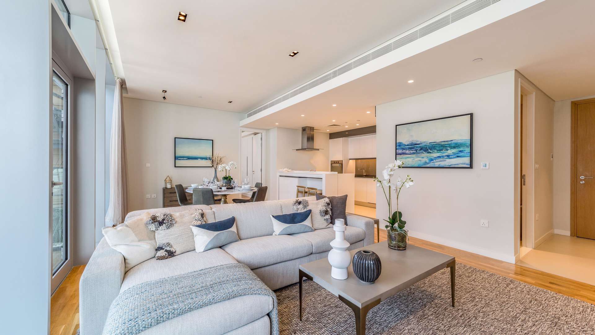 Modern bedroom in two-bedroom apartment, Bluewaters Island, featuring stylish decor and natural light
