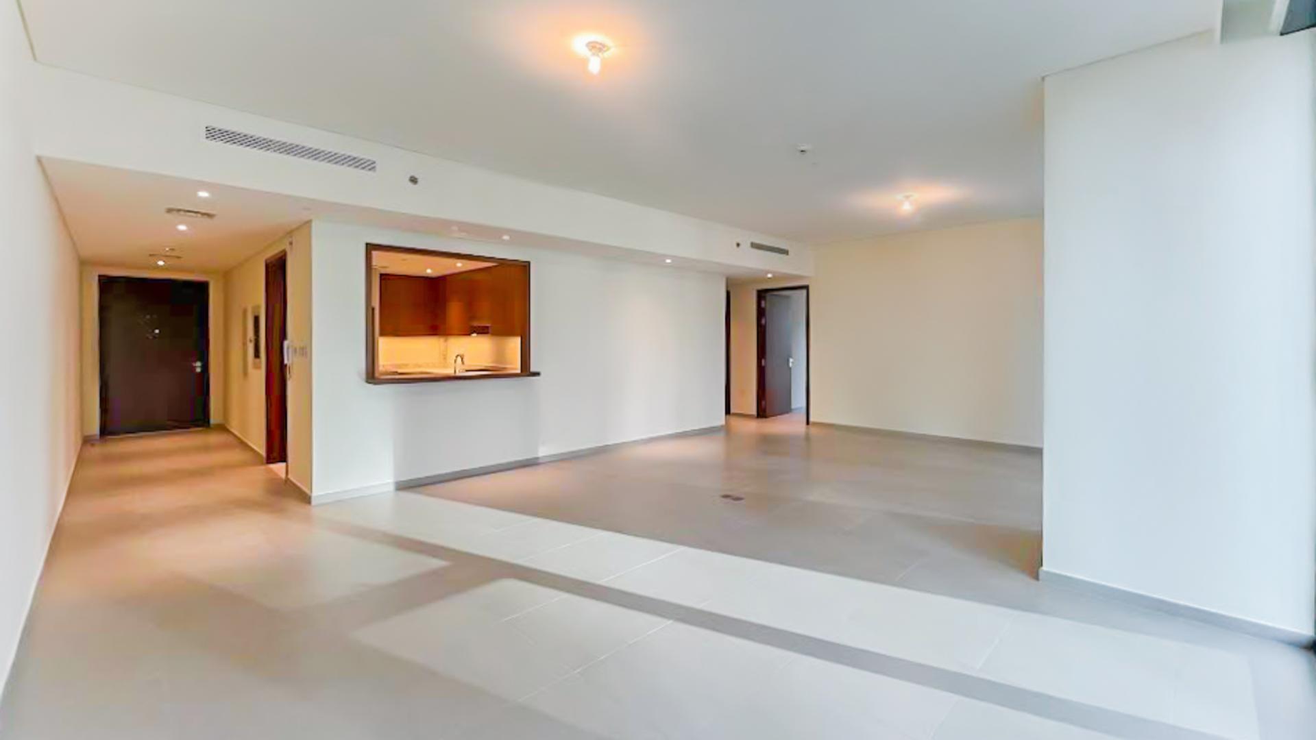 Spacious living area in Downtown Dubai apartment, BLVD Heights, featuring floor-to-ceiling windows