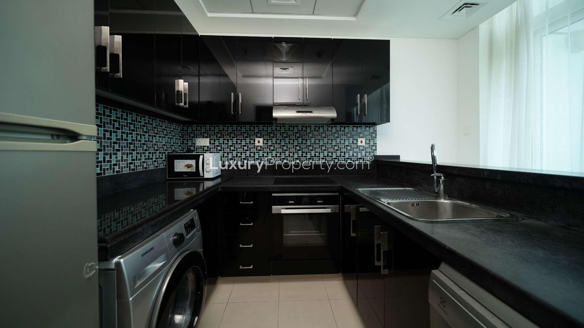 Modern living room in fully furnished Dubai Marina apartment, Botanica Tower, for sale