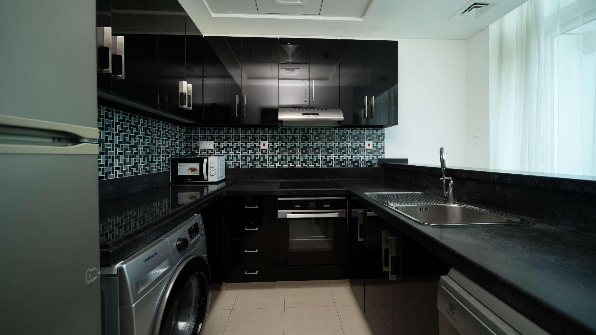 Modern living room in fully furnished Dubai Marina apartment, Botanica Tower, for sale