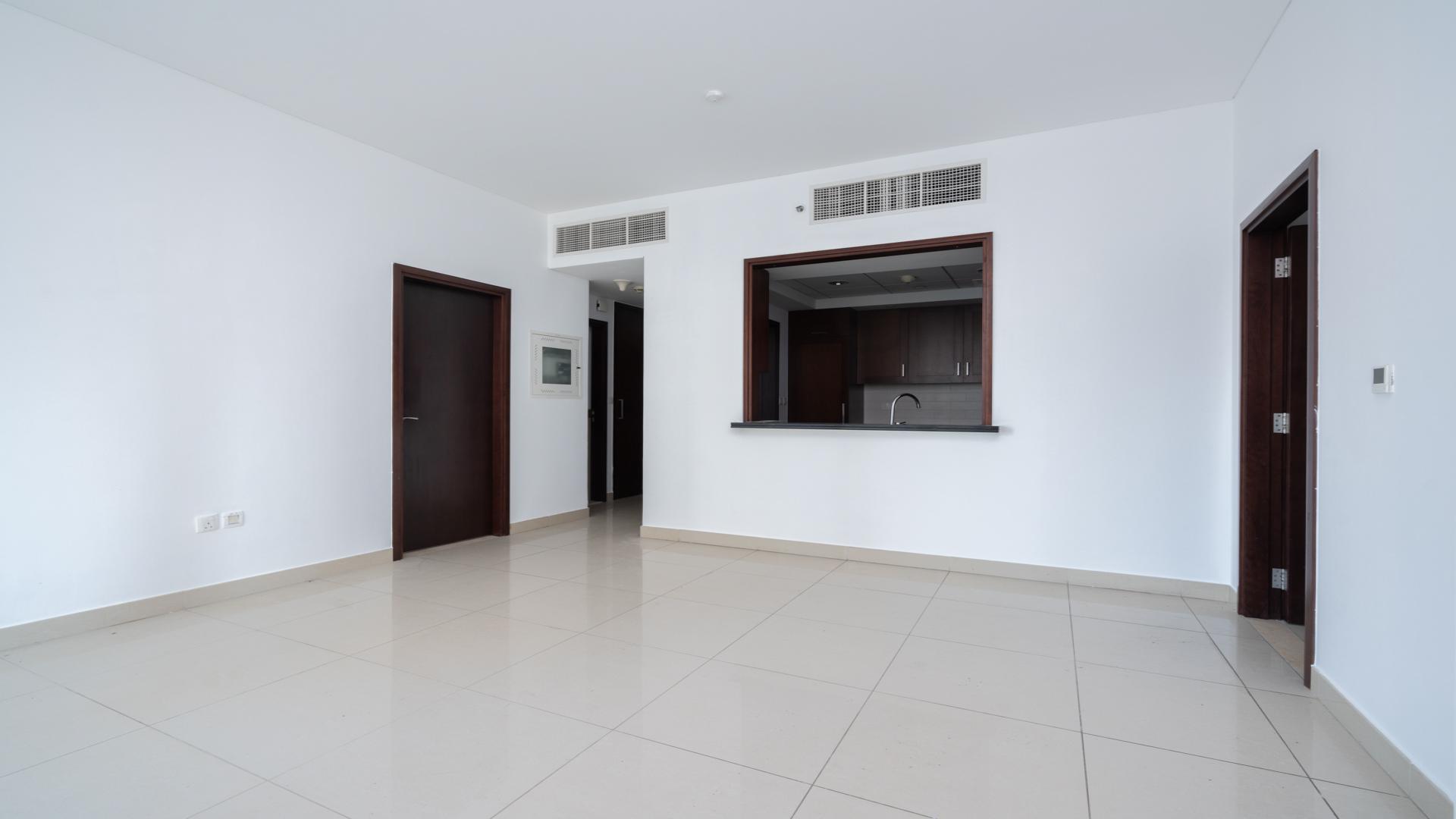 "Stunning view from 2-bed apartment in 29 Burj Boulevard, Downtown Dubai skyline visible.",Open-plan living area in 2-bed apartment, 29 Burj Boulevard, Downtown Dubai