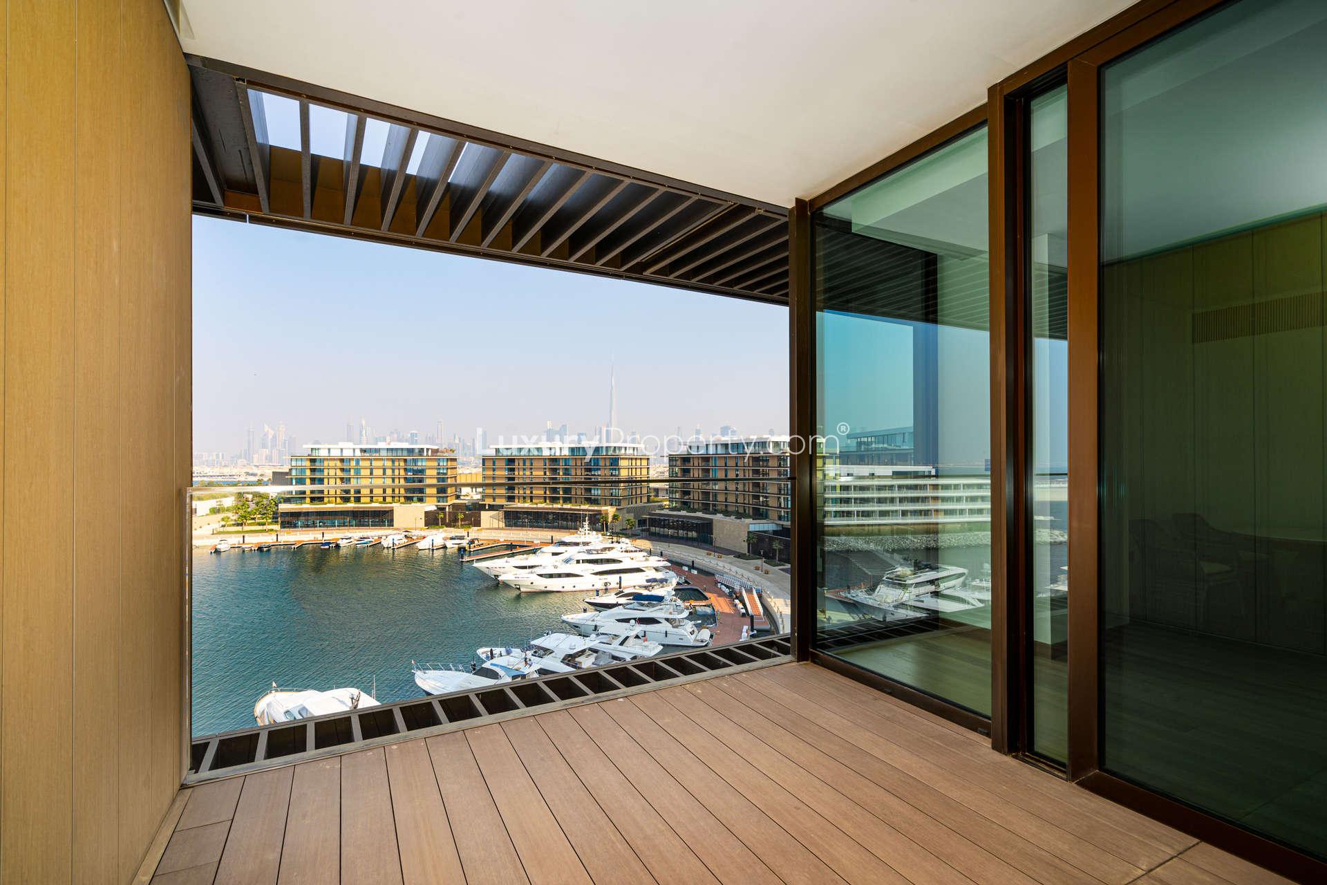 "Bright waterfront view from luxury apartment at Bulgari Residences, Jumeirah Bay.","Stunning waterfront view from Bulgari Residences apartment balcony, Jumeirah Bay Island, Dubai.",Exquisite waterfront apartment view at Bulgari Residences, Jumeirah Bay, Dubai marina skyline